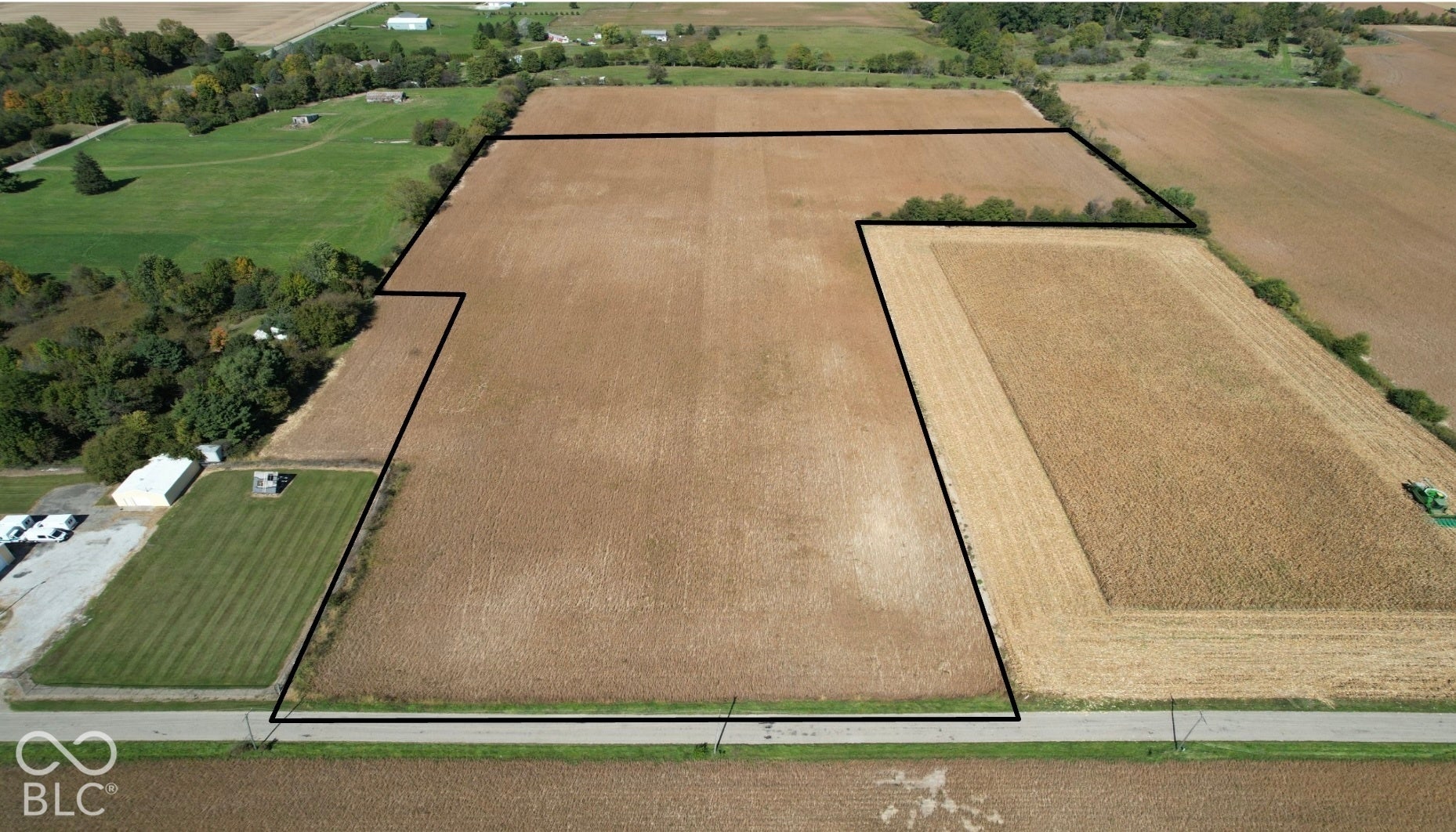 375 W North, Anderson, IN 46012 Expansive agricultural fields featuring defined property boundaries and an adjacent paved road