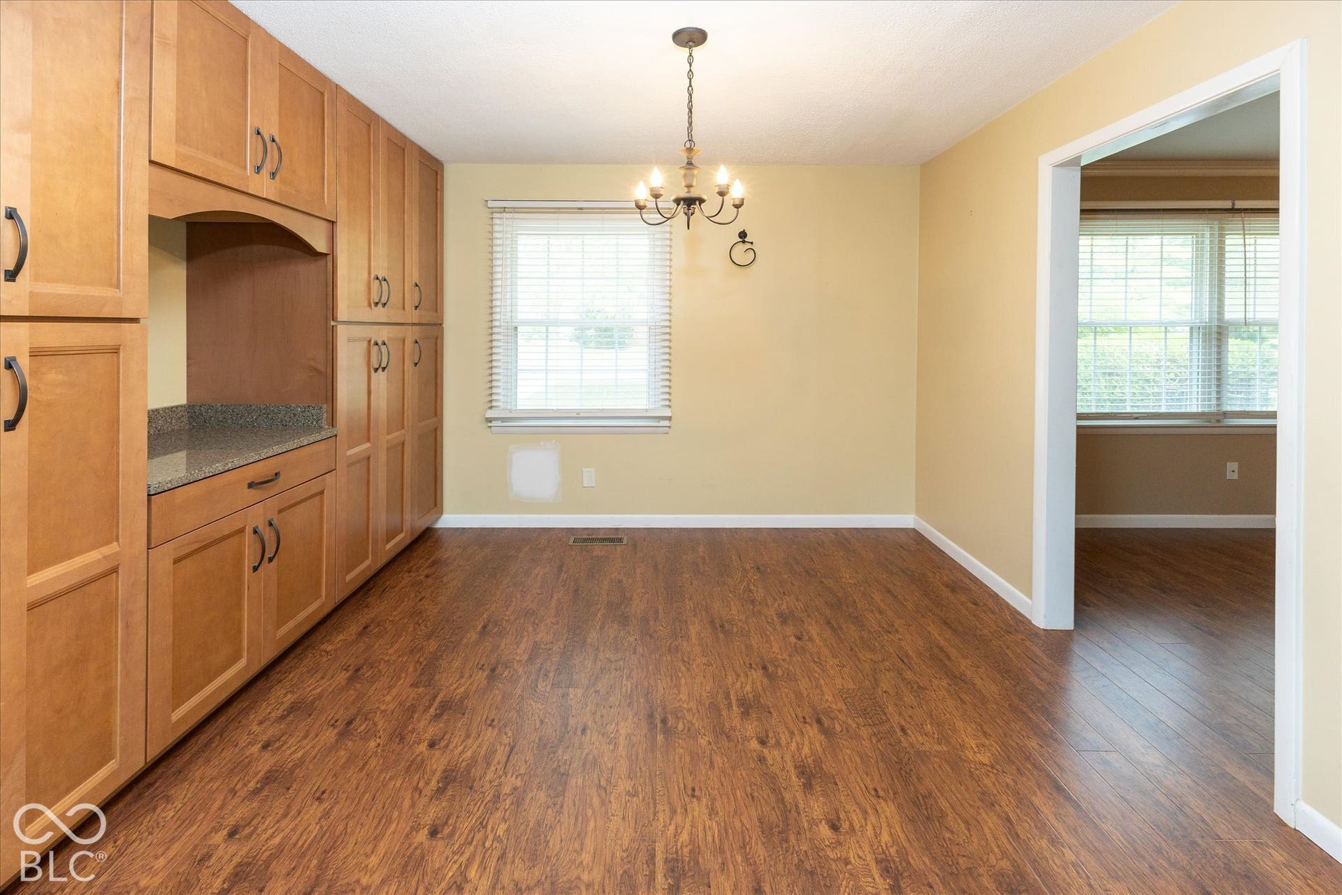 dining room with custom cabinets and coffee bar