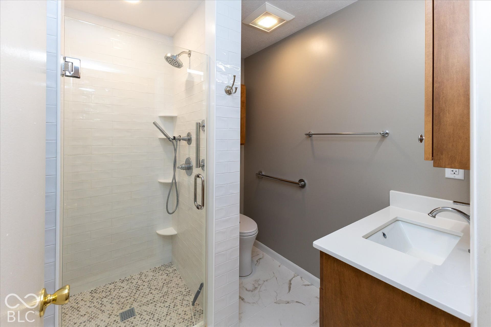 bathroom with walk in shower