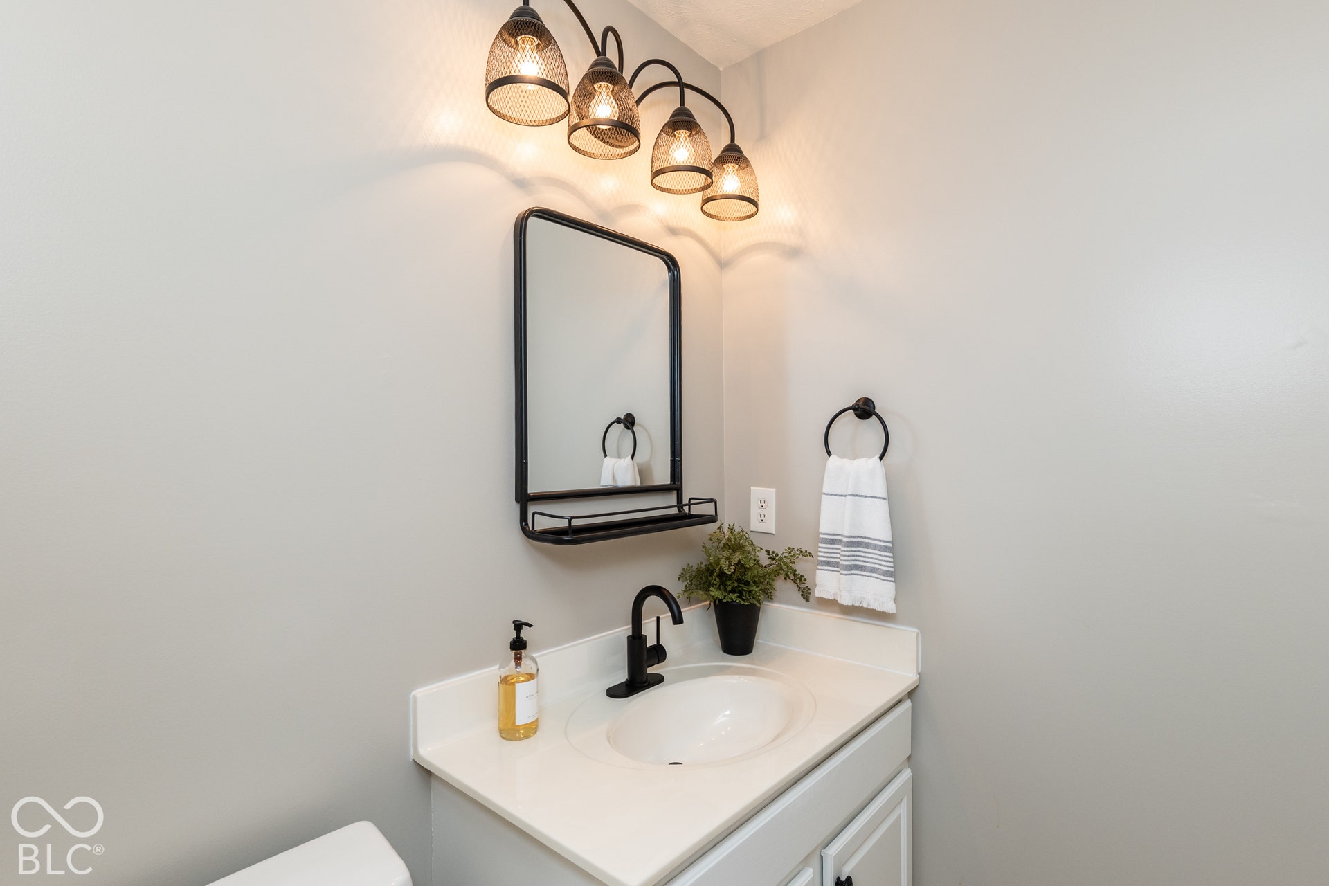 Vanity with an integrated sink and white countertop