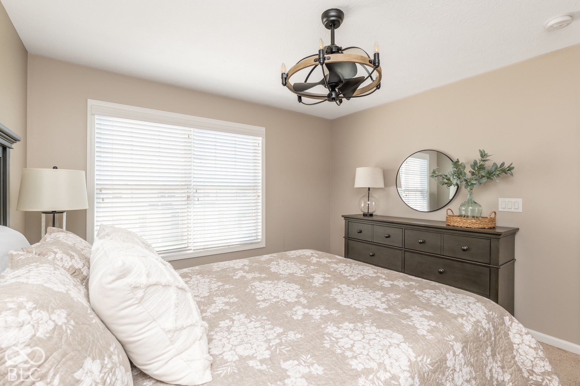 Ceiling fan with a wood and metal finish