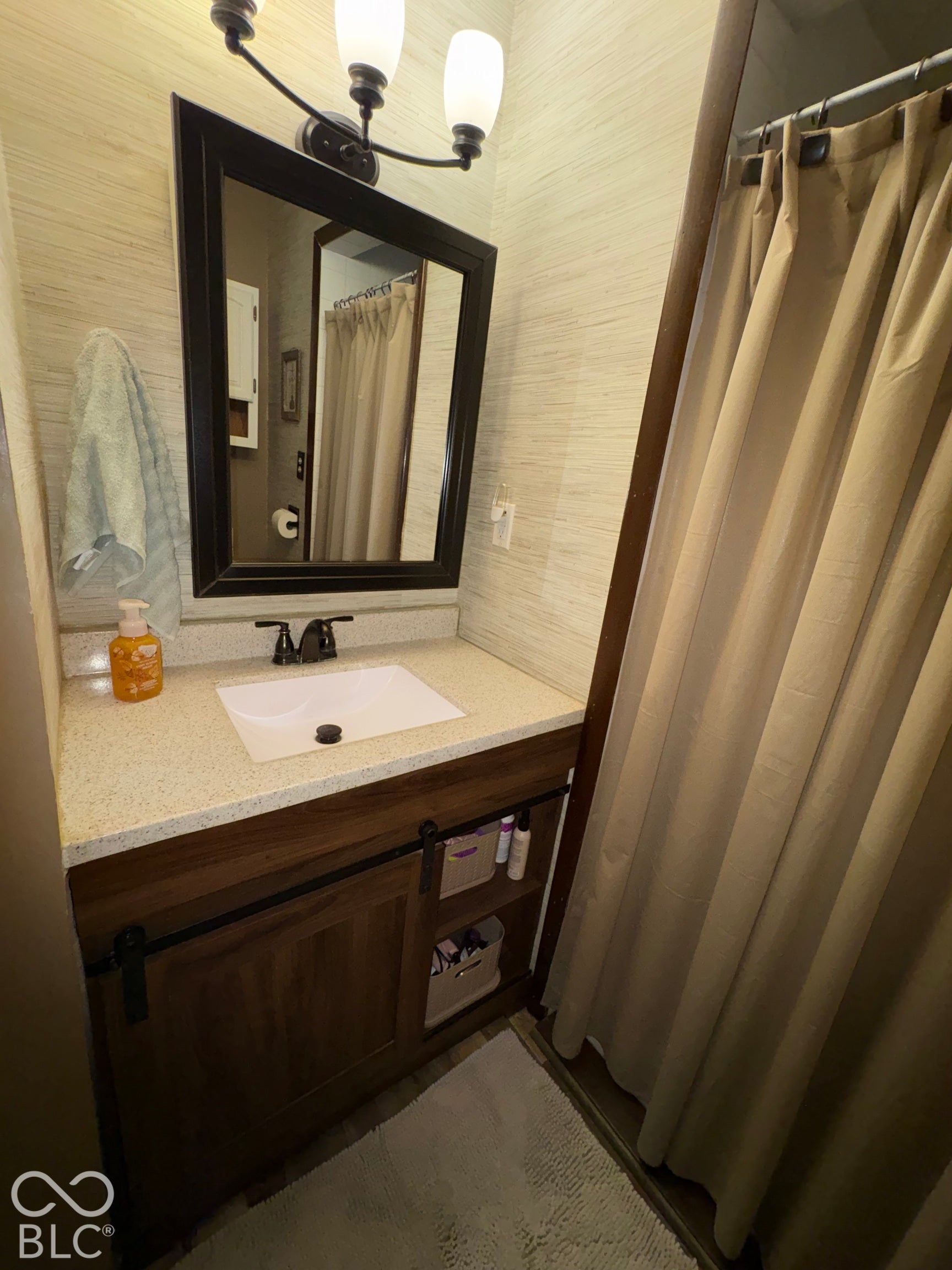 402 E Jackson Street, Farmland, IN 47340 Vanity with wood-finish cabinetry, white countertop, and integrated sink