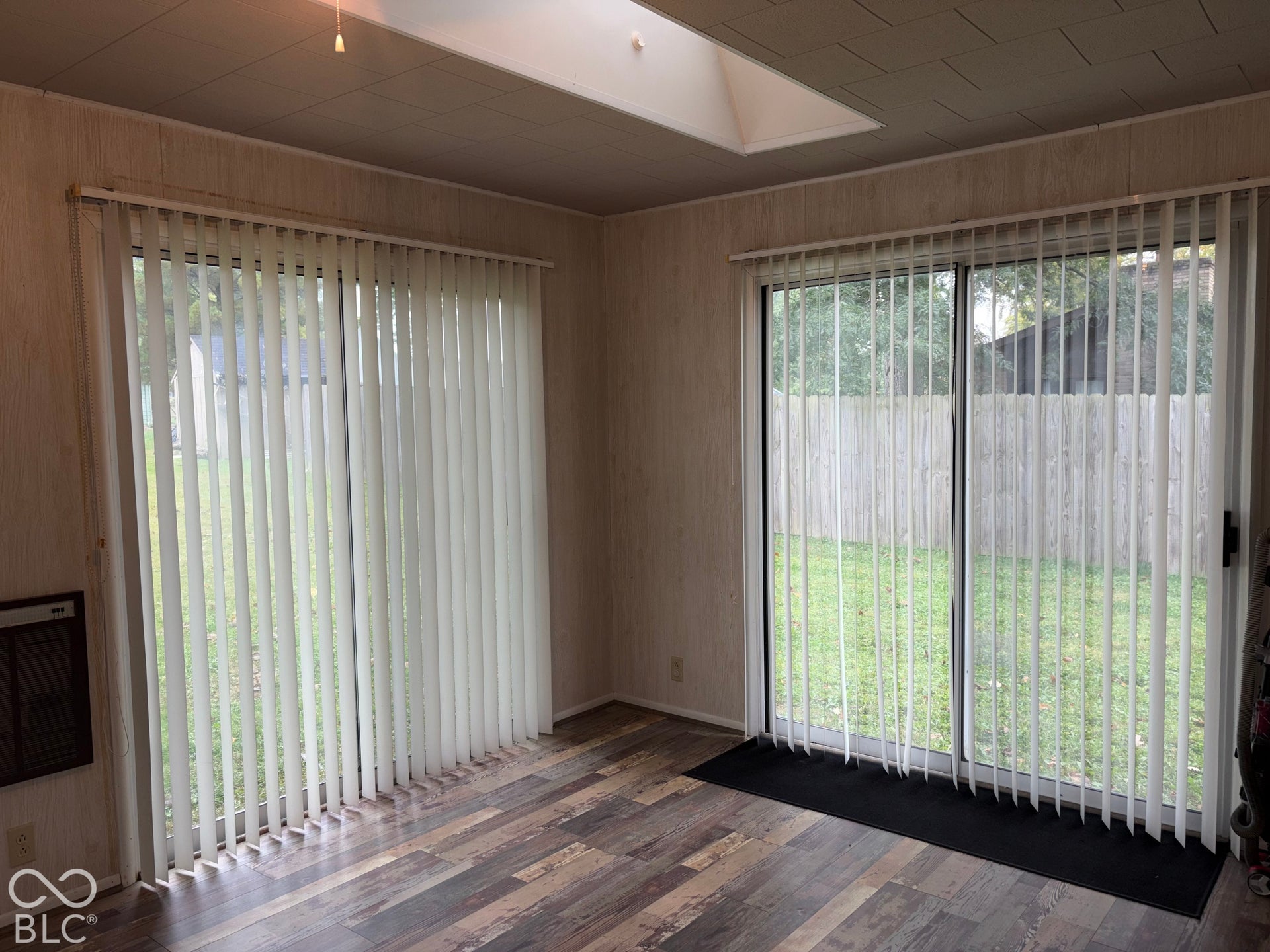 402 E Jackson Street, Farmland, IN 47340 Wood-finish flooring, two large sliding glass doors, and a skylight