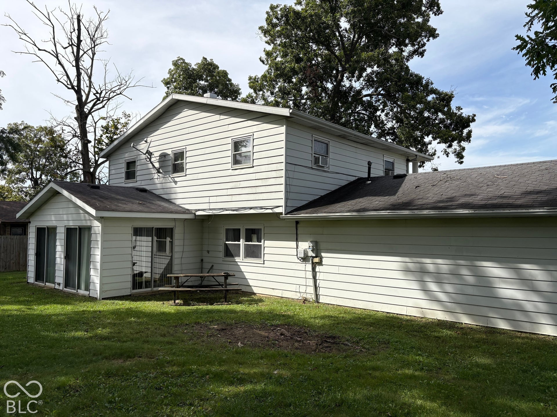 402 E Jackson Street, Farmland, IN 47340 Two-story residence with light-colored siding