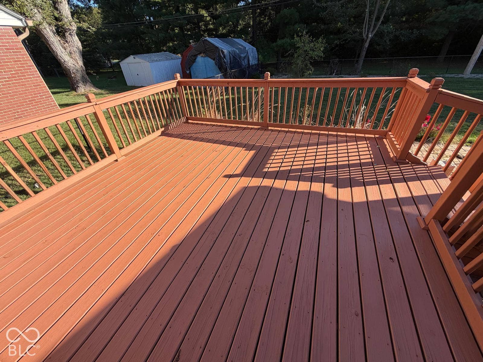2819 E Edgewood Avenue, Indianapolis, IN 46227 Expansive outdoor deck with wood railing and balusters