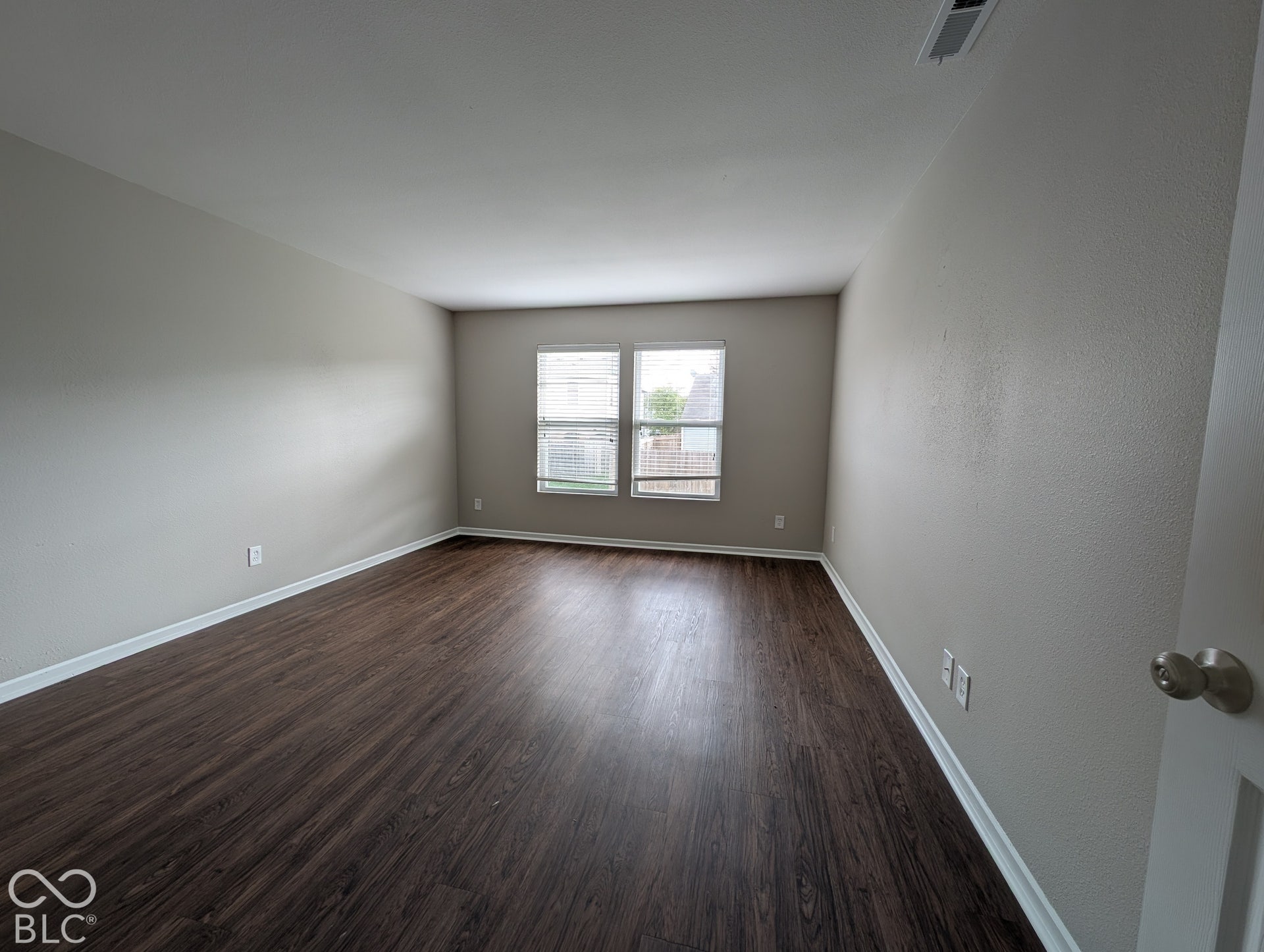 Wood-finish flooring with white trim