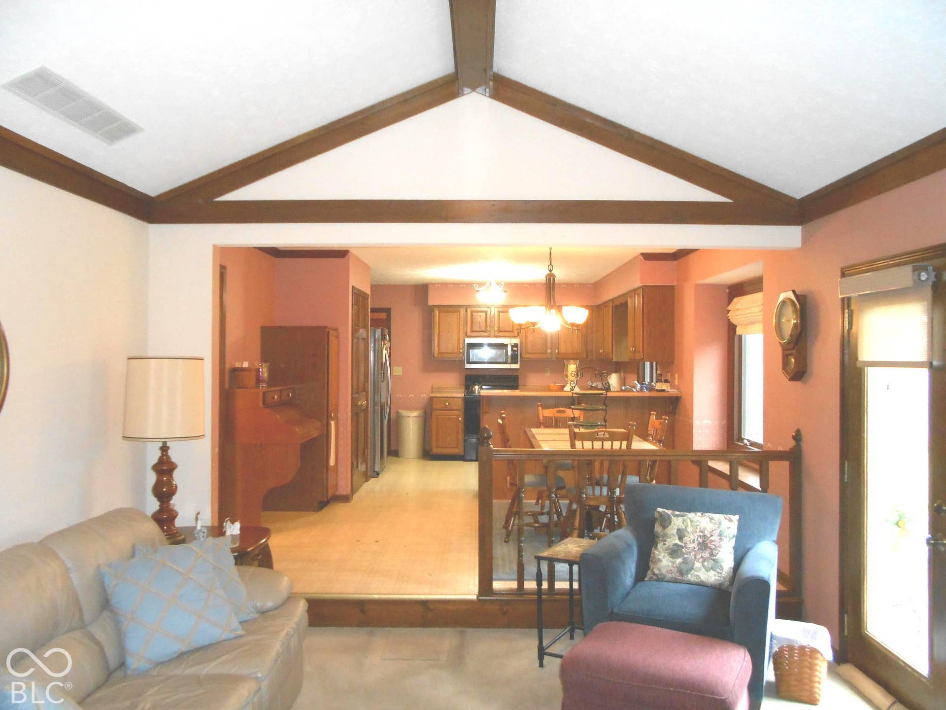 Vaulted ceiling with exposed wood beams