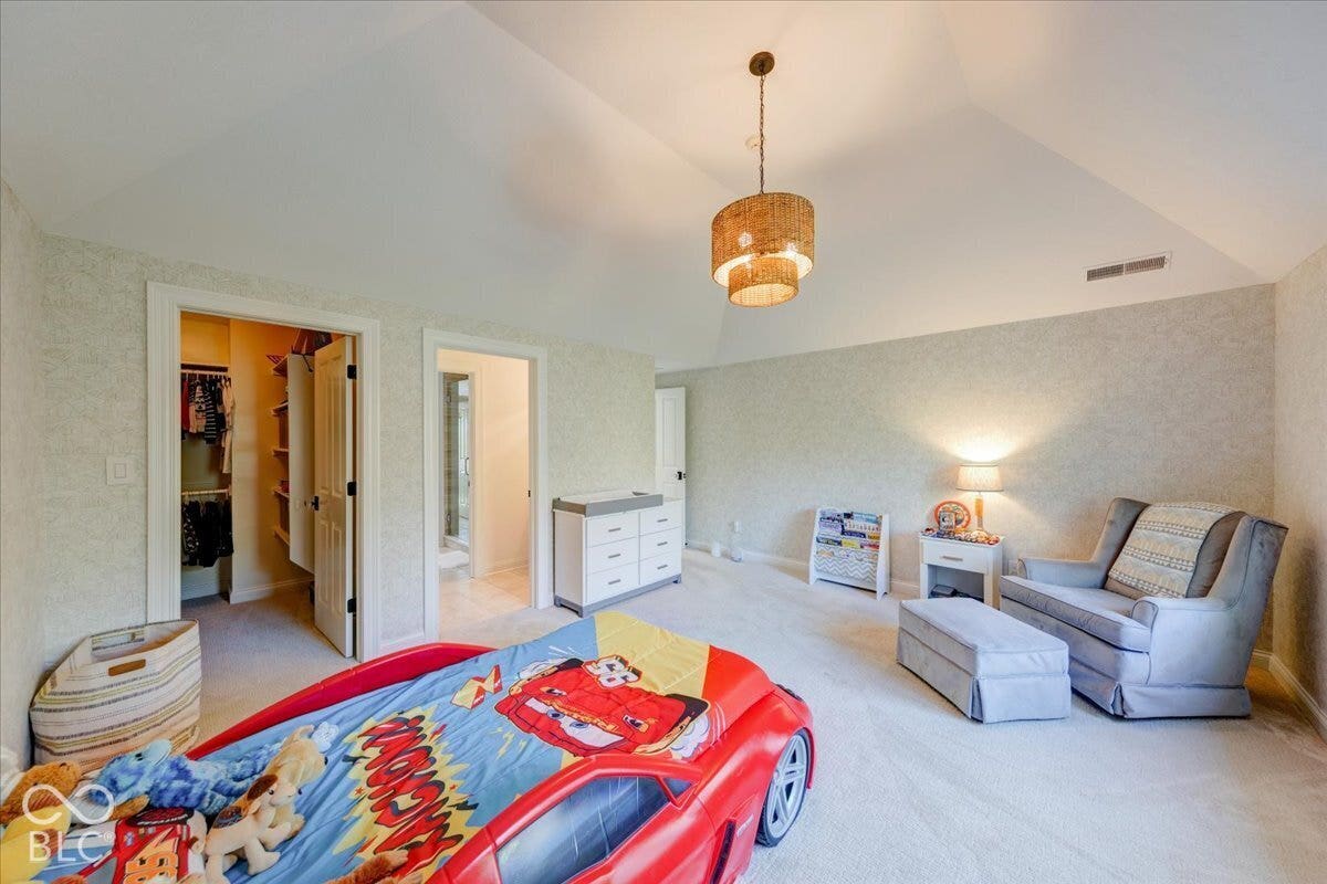 Vaulted ceiling with a tiered pendant light fixture