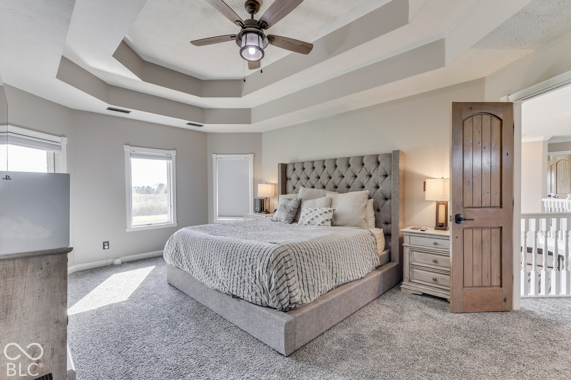 1307 E 125 S, Franklin, IN 46131 French doors lead to the primary with seating area and private balcony overlooking the property.