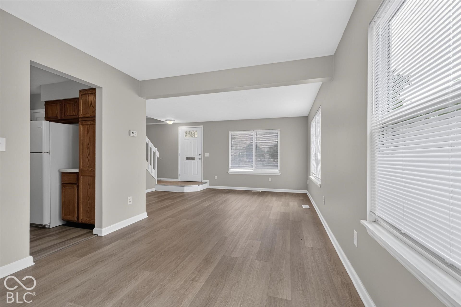 Dining area with abundant natural light and neutral paint