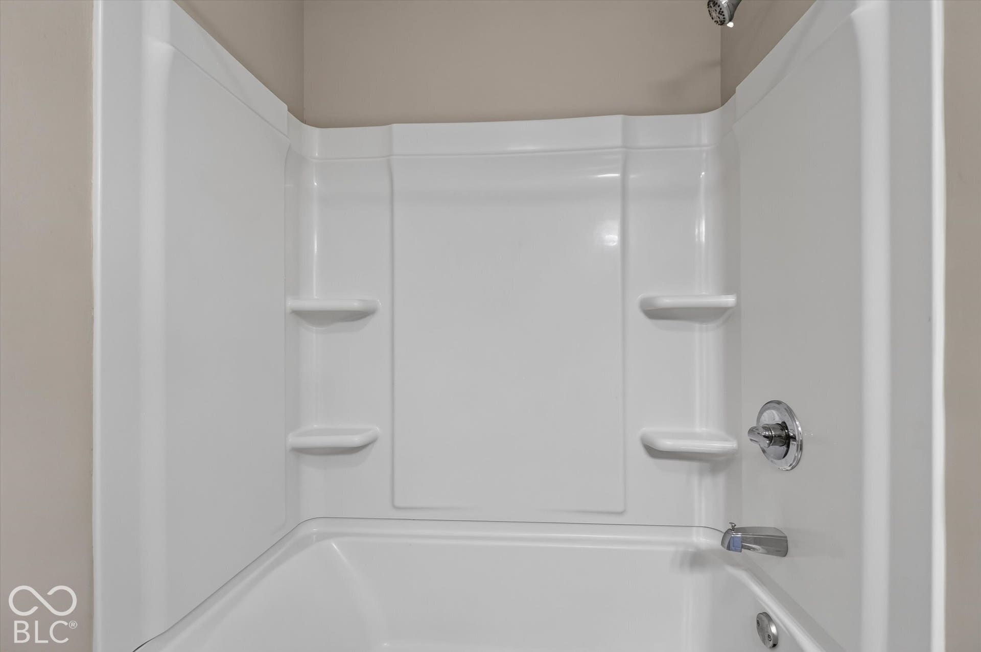 Full bathroom featuring a vanity and shower/bathtub combination