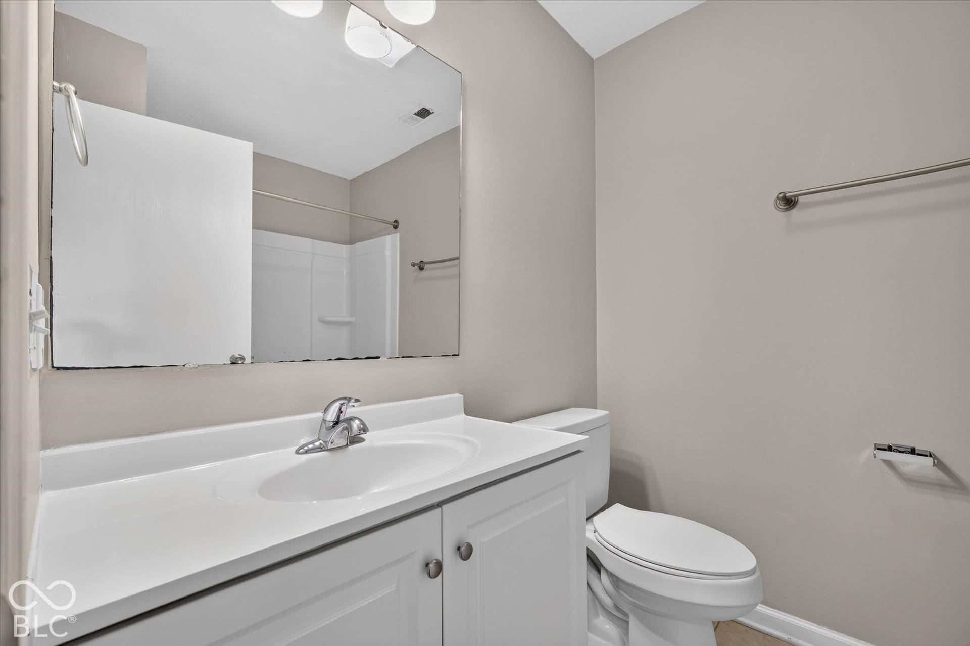 Full bathroom featuring a vanity and shower/bathtub combination