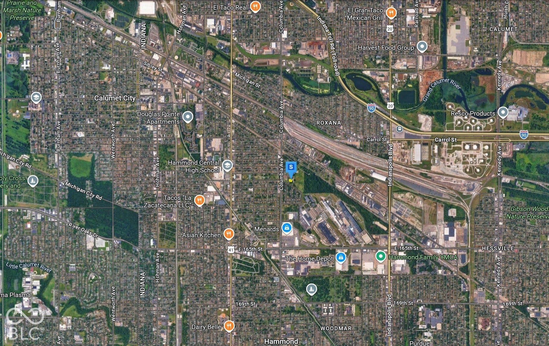 Aerial Satellite Map. Displaying a localized area with various geographical features and infrastructure elements, including a marked property location