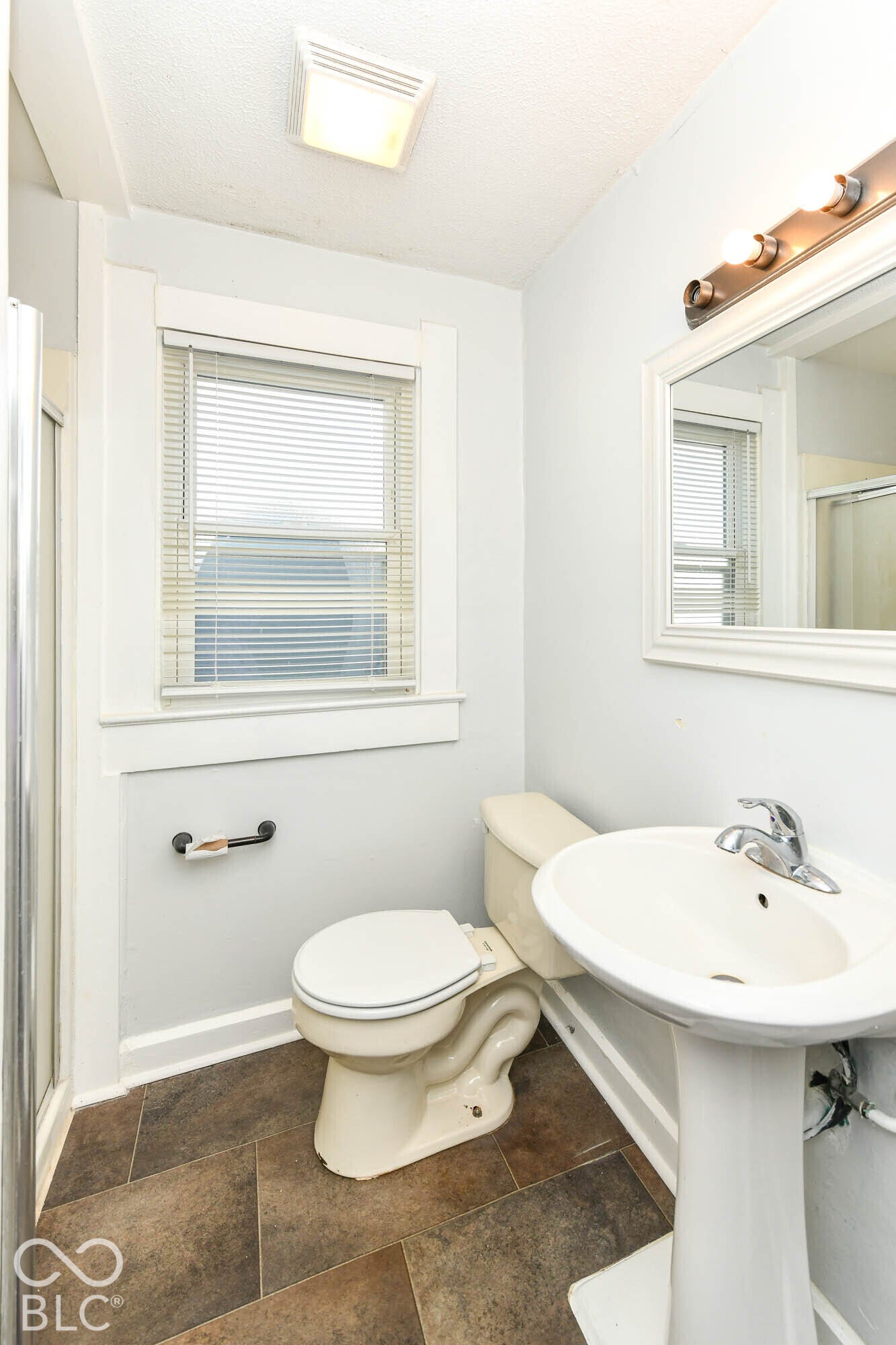 896 Young Street, Franklin, IN 46131 Bathroom has a pedestal sink and shower stall.