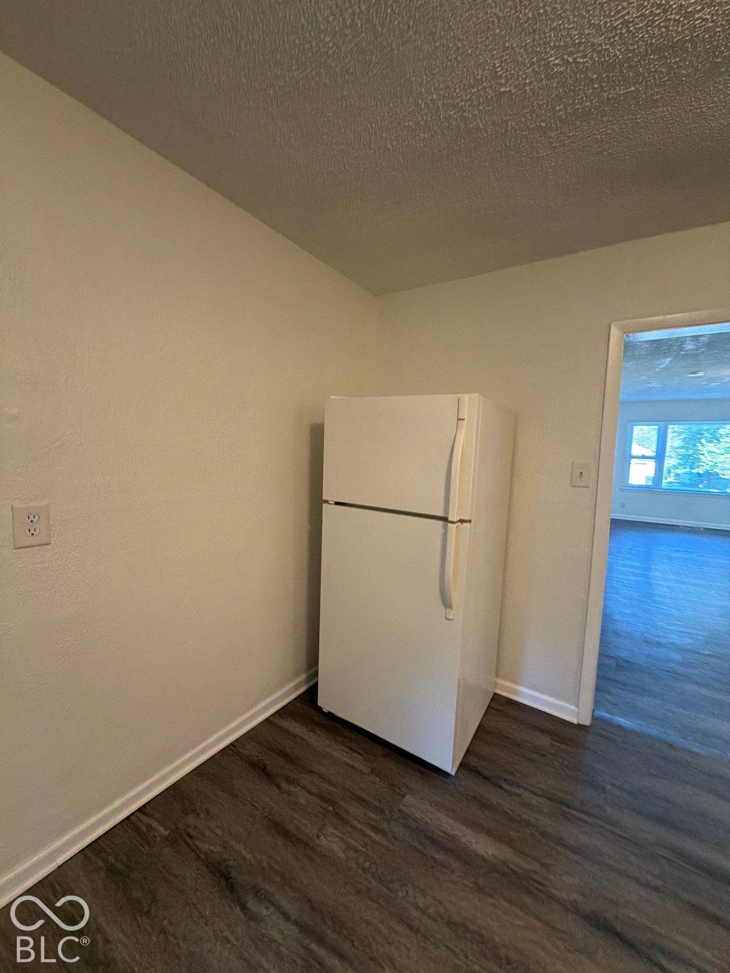 Wood-finish flooring throughout