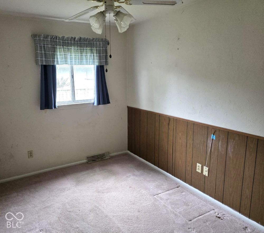 Bedroom 2 is centered between the primary and the 3rd bedroom
