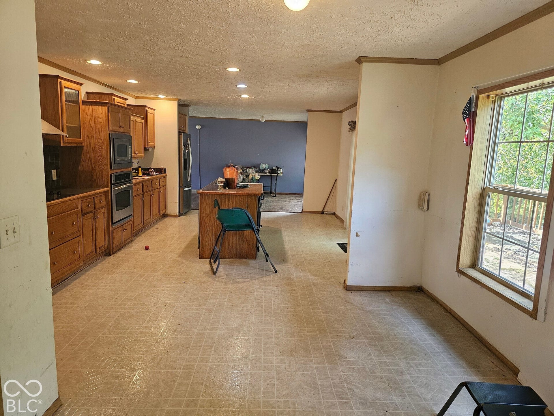 Virtually Altered - Spacious large kitchen with plenty of storage space and a full pantry.  Extra room for an eat-in area.