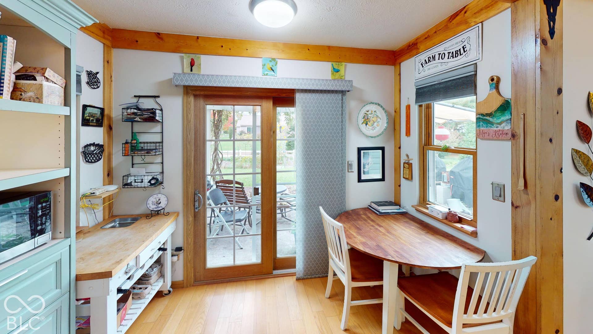 Breakfast Area inside the Kitchen. *Aka: Kitchen-eat in option such as breakfast nooks. Wood-finish flooring with natural wood trim