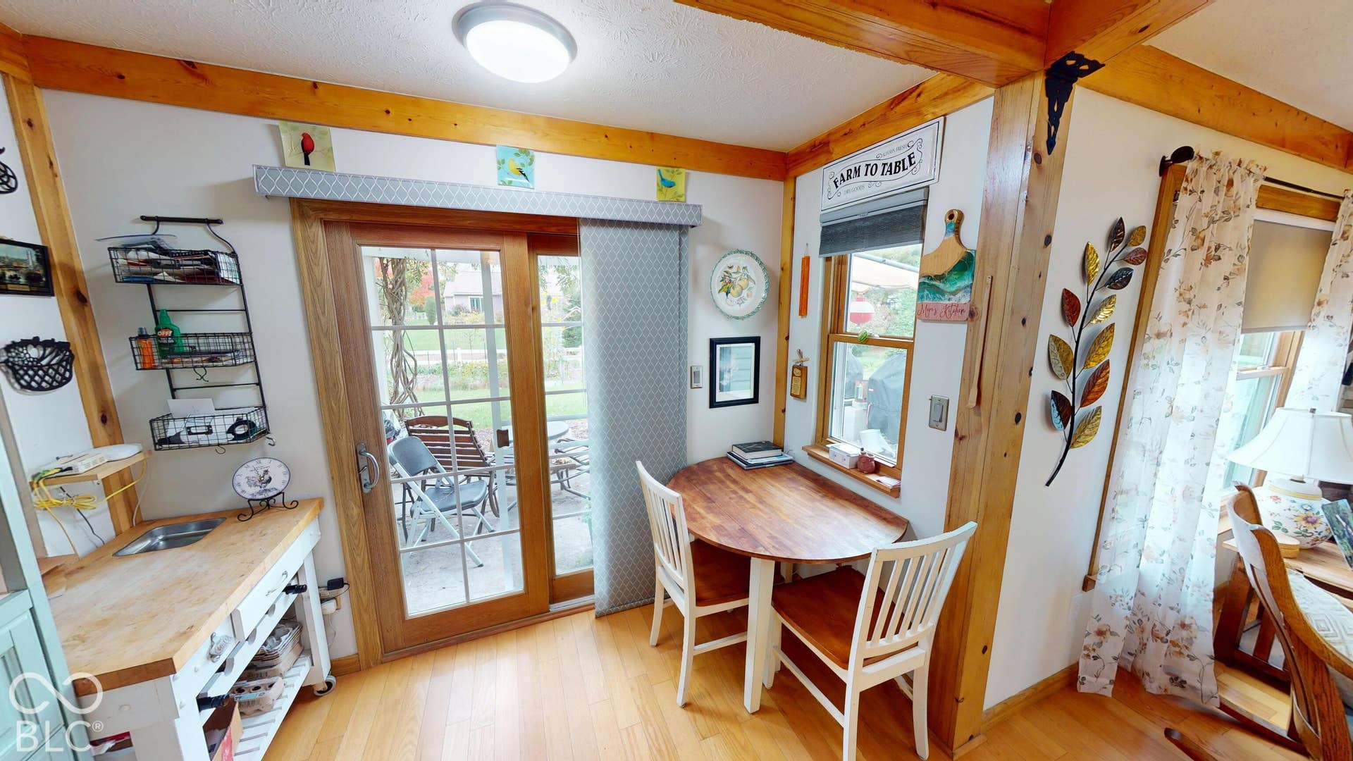 Breakfast Area/Nook to allow for a kitchen eat in experience without having to use a formal dining room. - Wood-finish flooring with exposed wood beams and trim