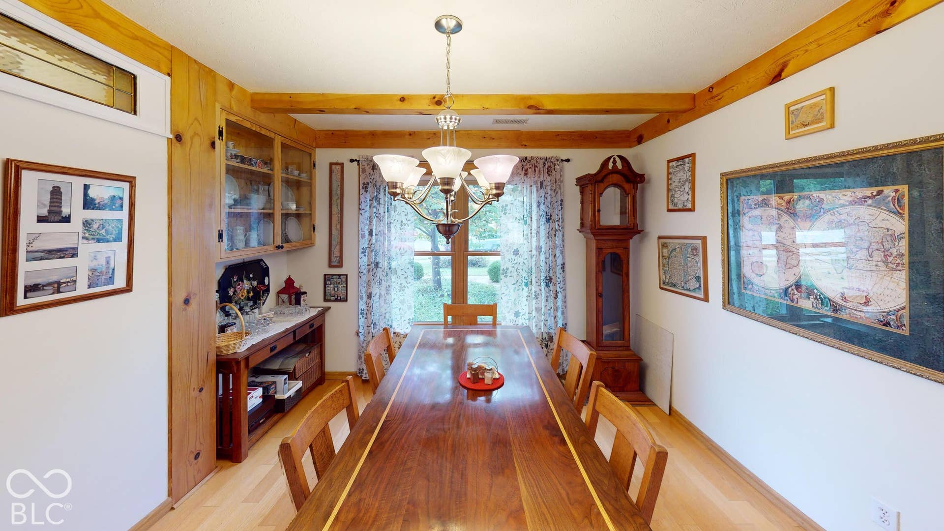 Wood-finish flooring with exposed wood beams