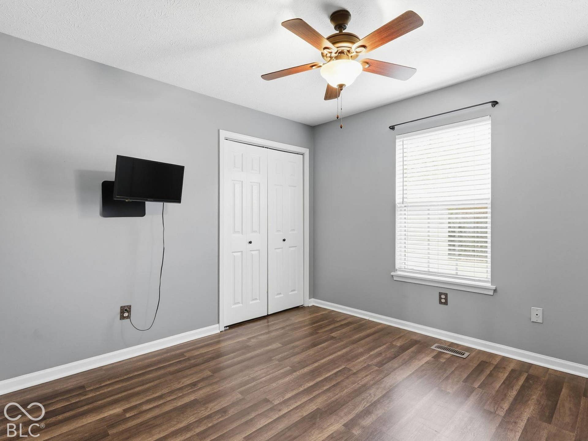 Bedroom #3 has a mounted TV that stays.