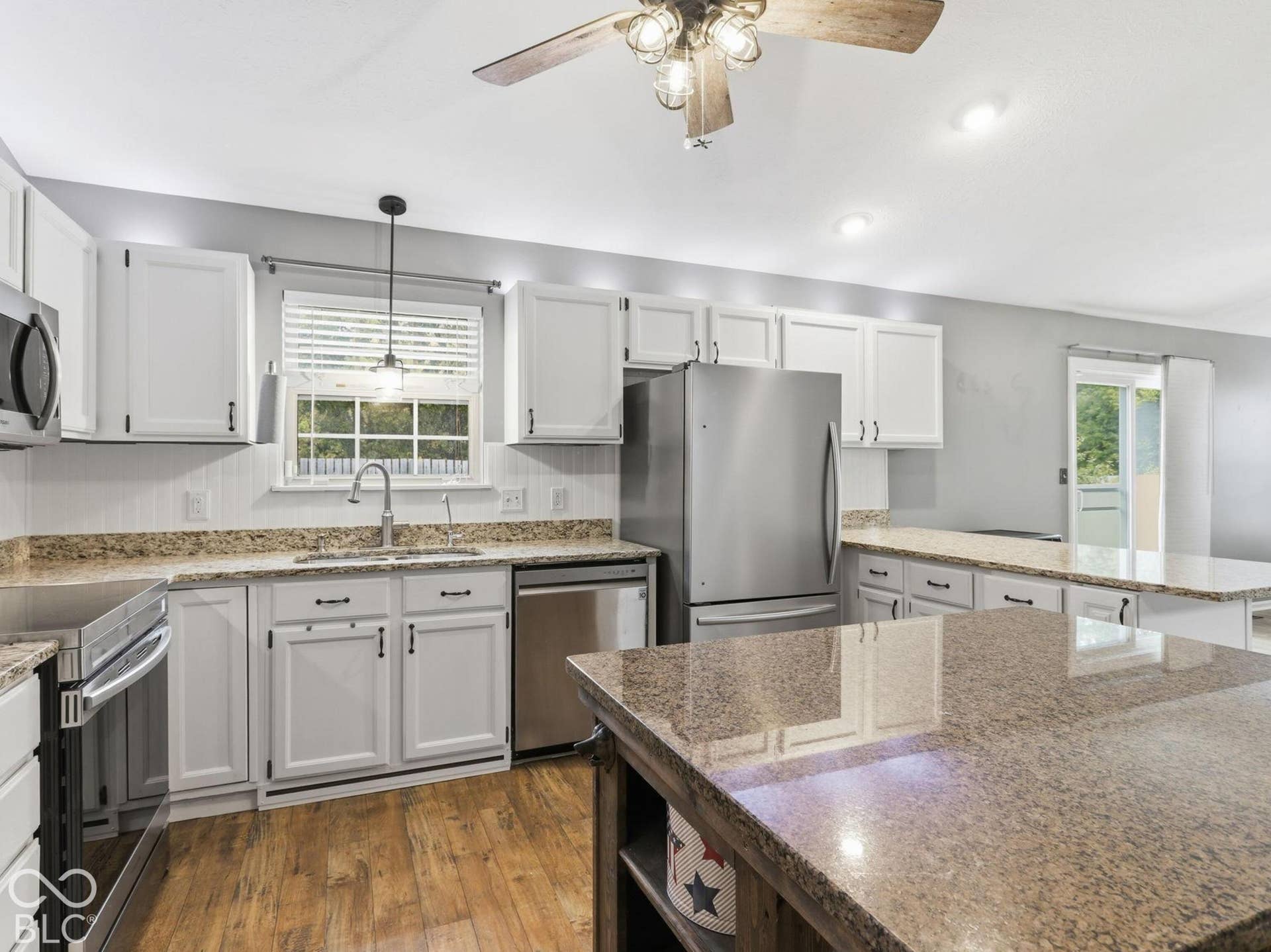 Granite countertop and a new backsplash
