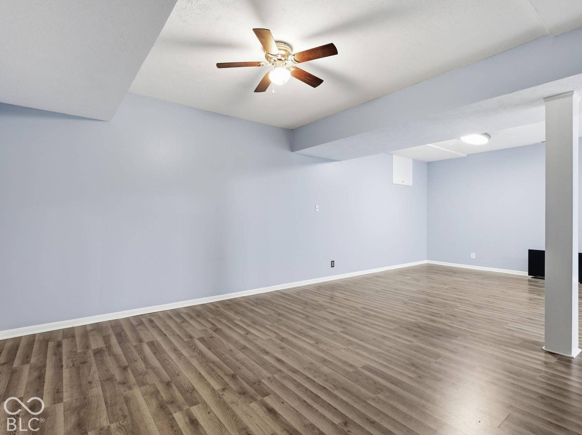 Finished basement with luxury vinyl flooring