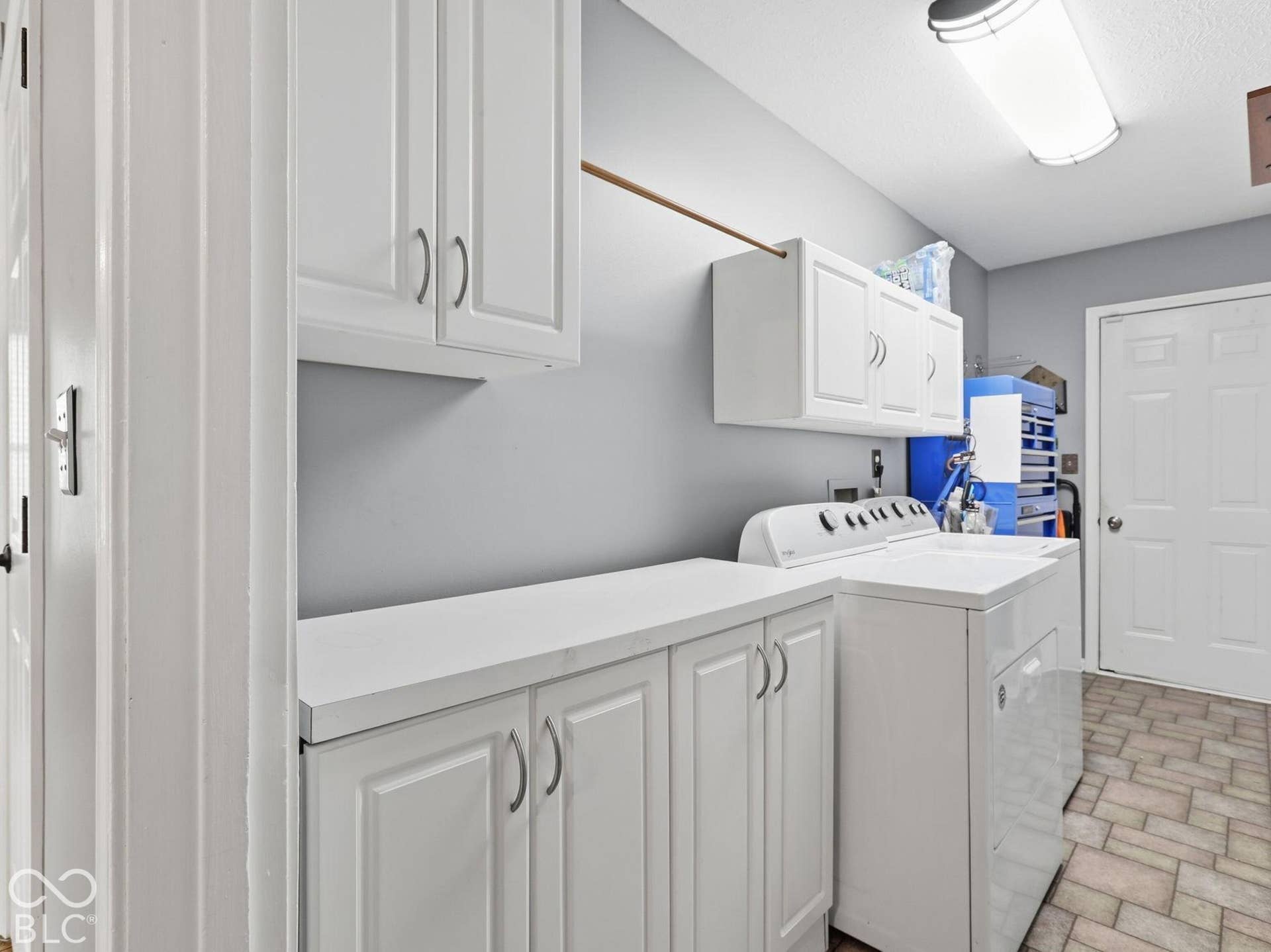 Laundry room is on the main floor.  It has storage cabinets, and the room leads to the garage.