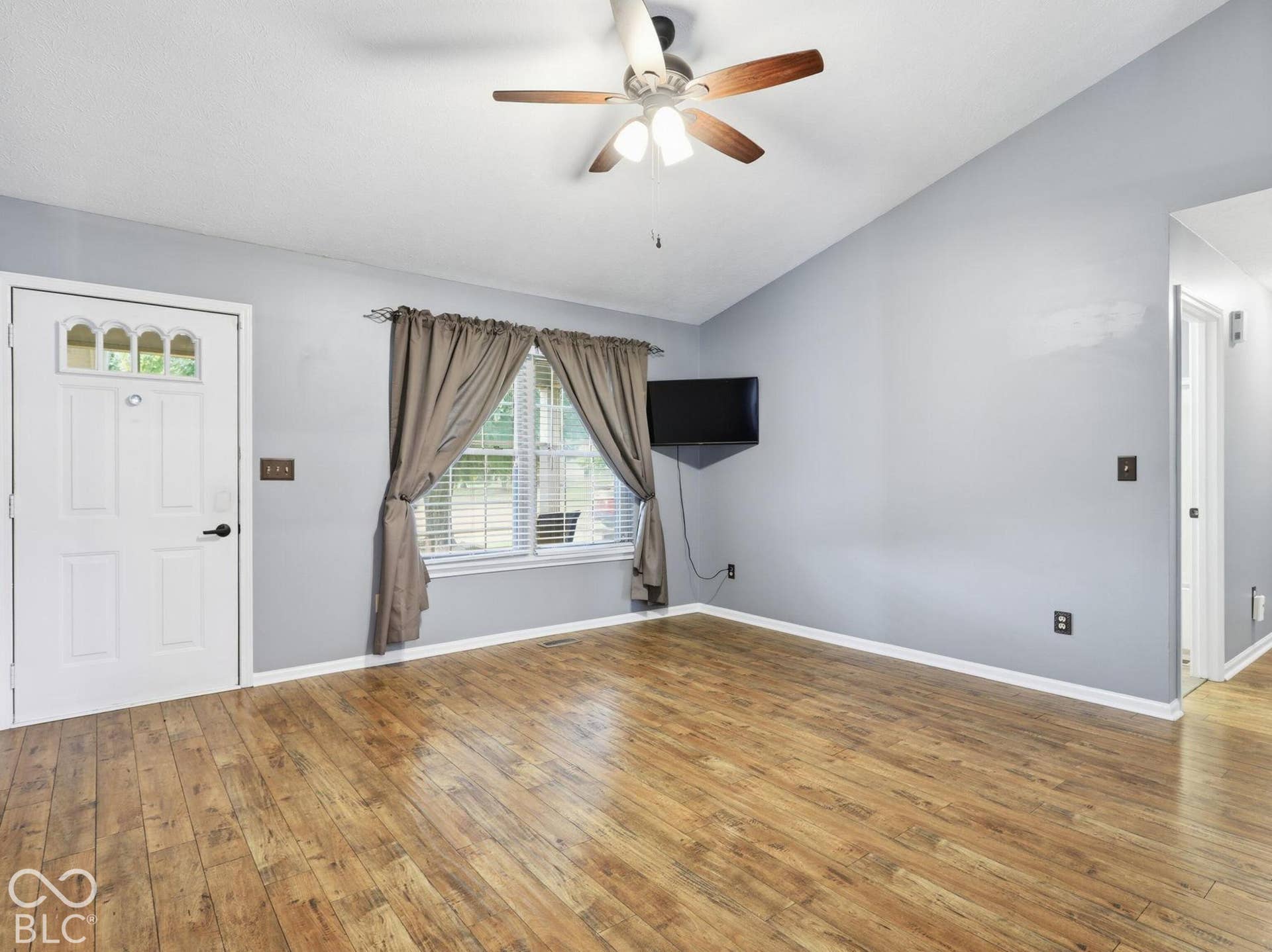 This large room could be used as a living area or a large dining room space