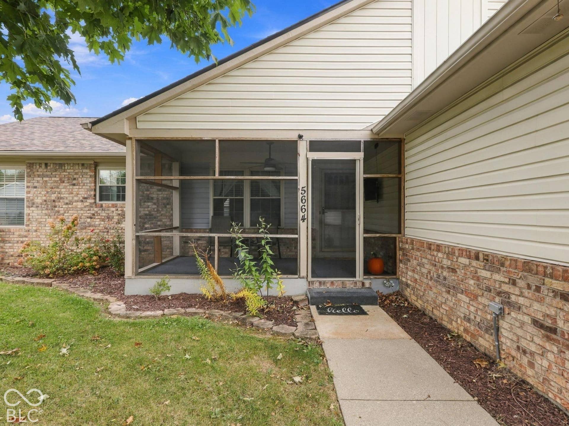 The home welcomes you with a large screened in front porch - perfect for relaxation!