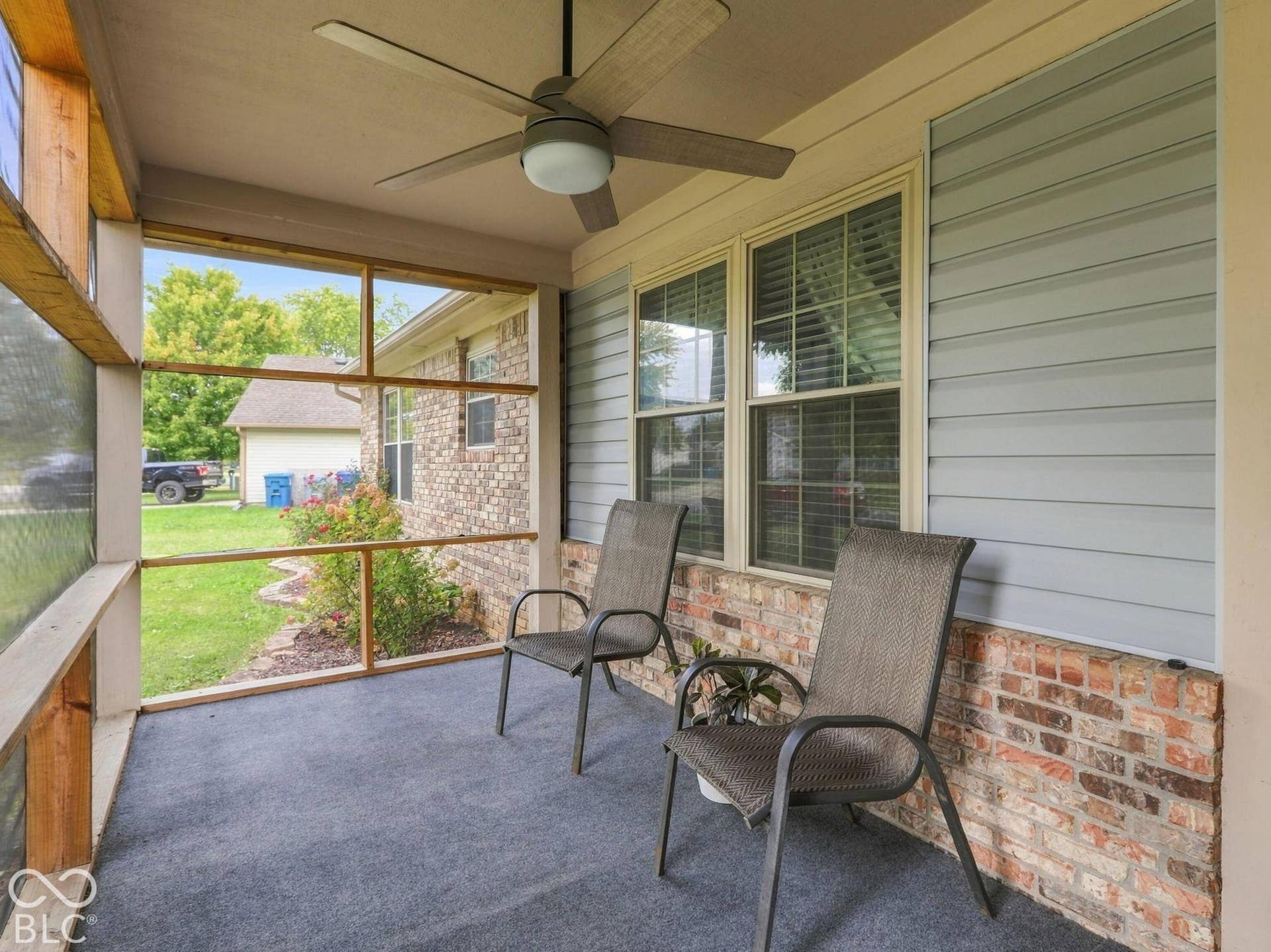 Outdoor carpeting covers the porch - nice on your feet!
