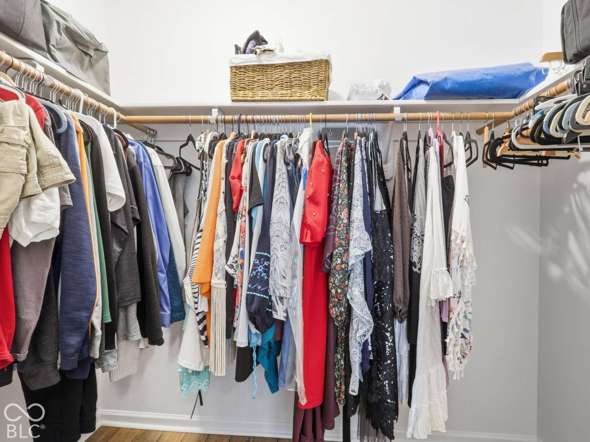 Primary bedroom walk in closet