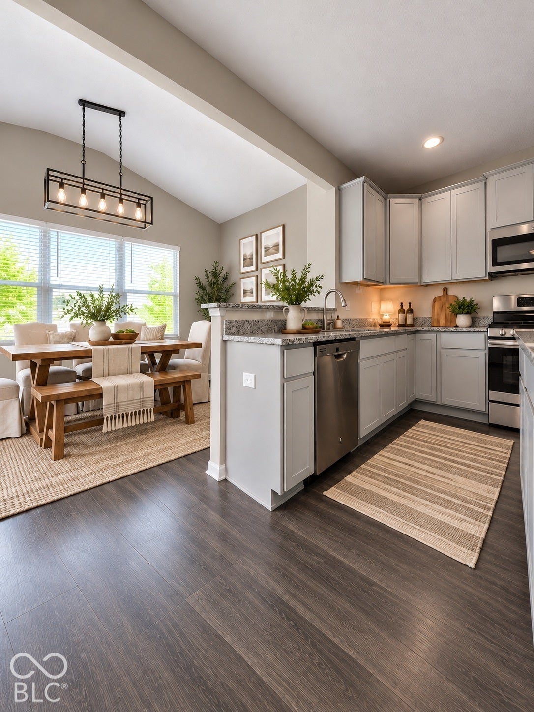 Virtually Altered - Such a beautiful kitchen with upgraded counters and cabinets. Flows seamlessly to the dining area