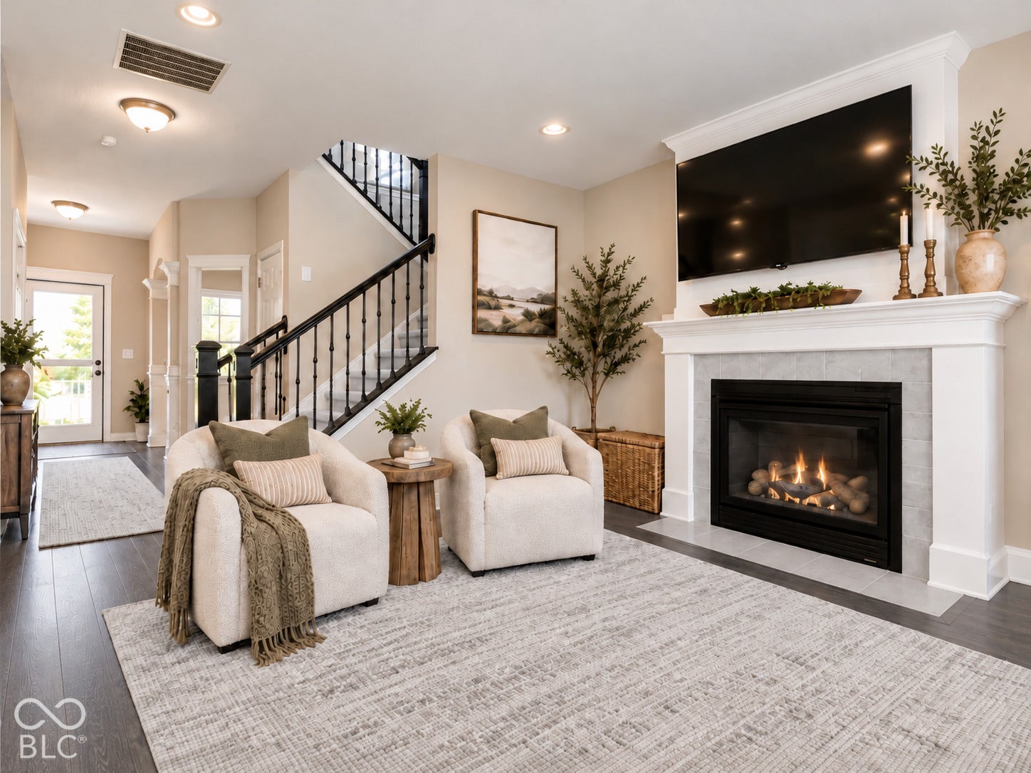 Virtually Altered - Virtually staged family room with gas fireplace and lots of natural light