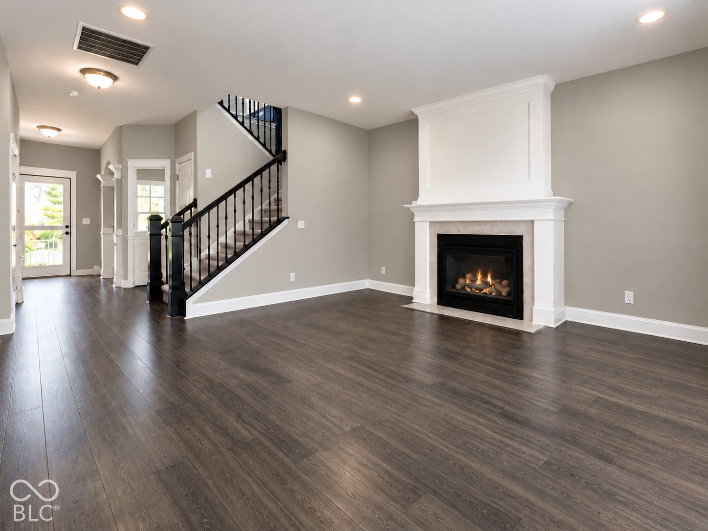 Beautiful family room with gas fireplace and lots of natural light