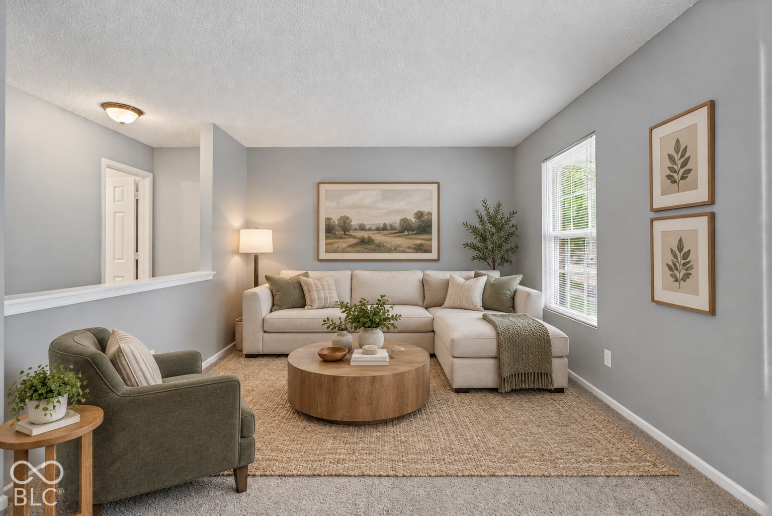Virtually Altered - Neutral-toned walls, double-hung window, semi-wall partition with a capped ledge, and recessed ceiling lighting