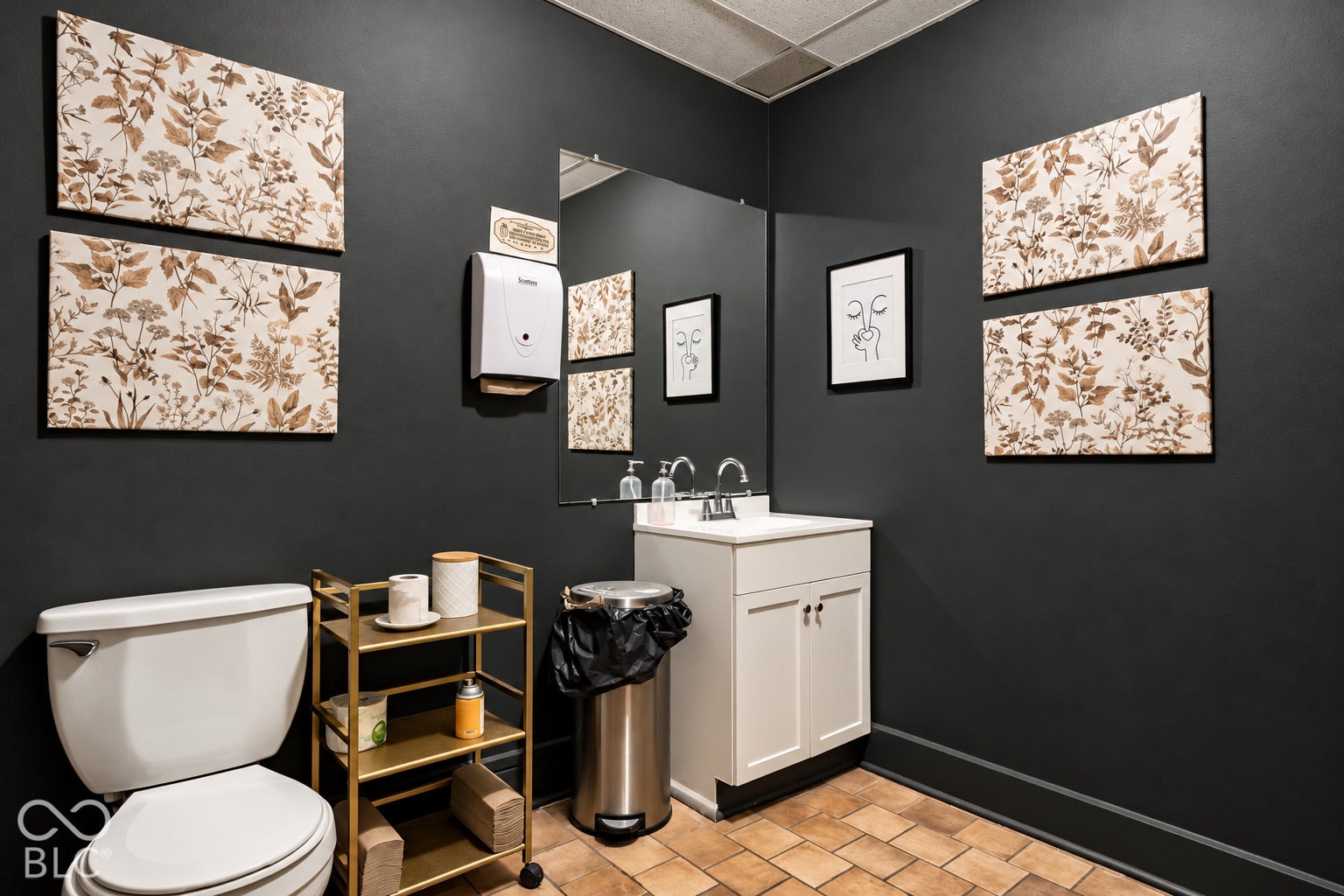 2602 Shelby Street, Indianapolis, IN 46203 Virtually Altered - Bathroom featuring dark matte walls, tile flooring, a white vanity cabinet with an integrated sink, and a large wall-mounted mirror