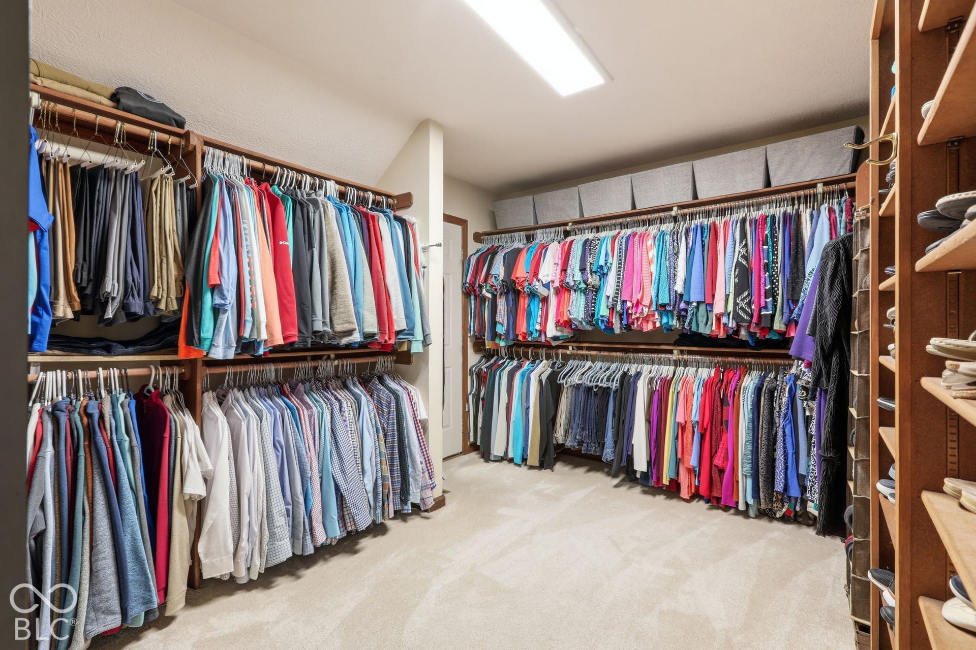 Spacious Closet with Oranizers and access to Attic space over the 3-car garage