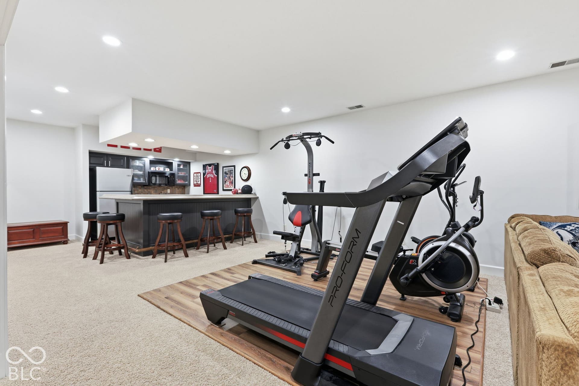 Space to accomodate Exercise Equipment with Flooring that is easily moved if needed