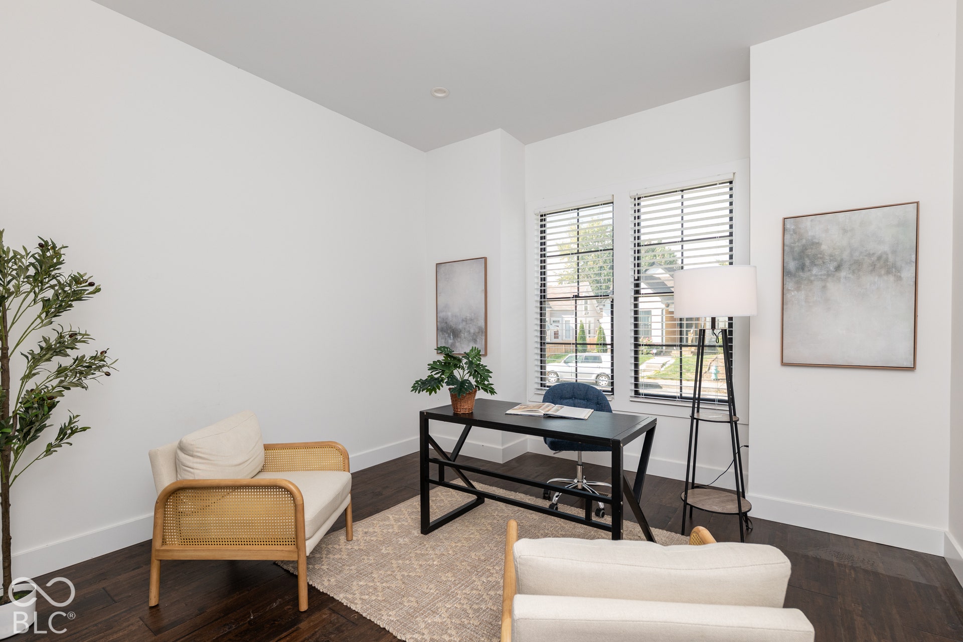 1401 Olive Street, Indianapolis, IN 46203 Room featuring wood-finish flooring, high ceilings, and double-pane windows with horizontal blinds