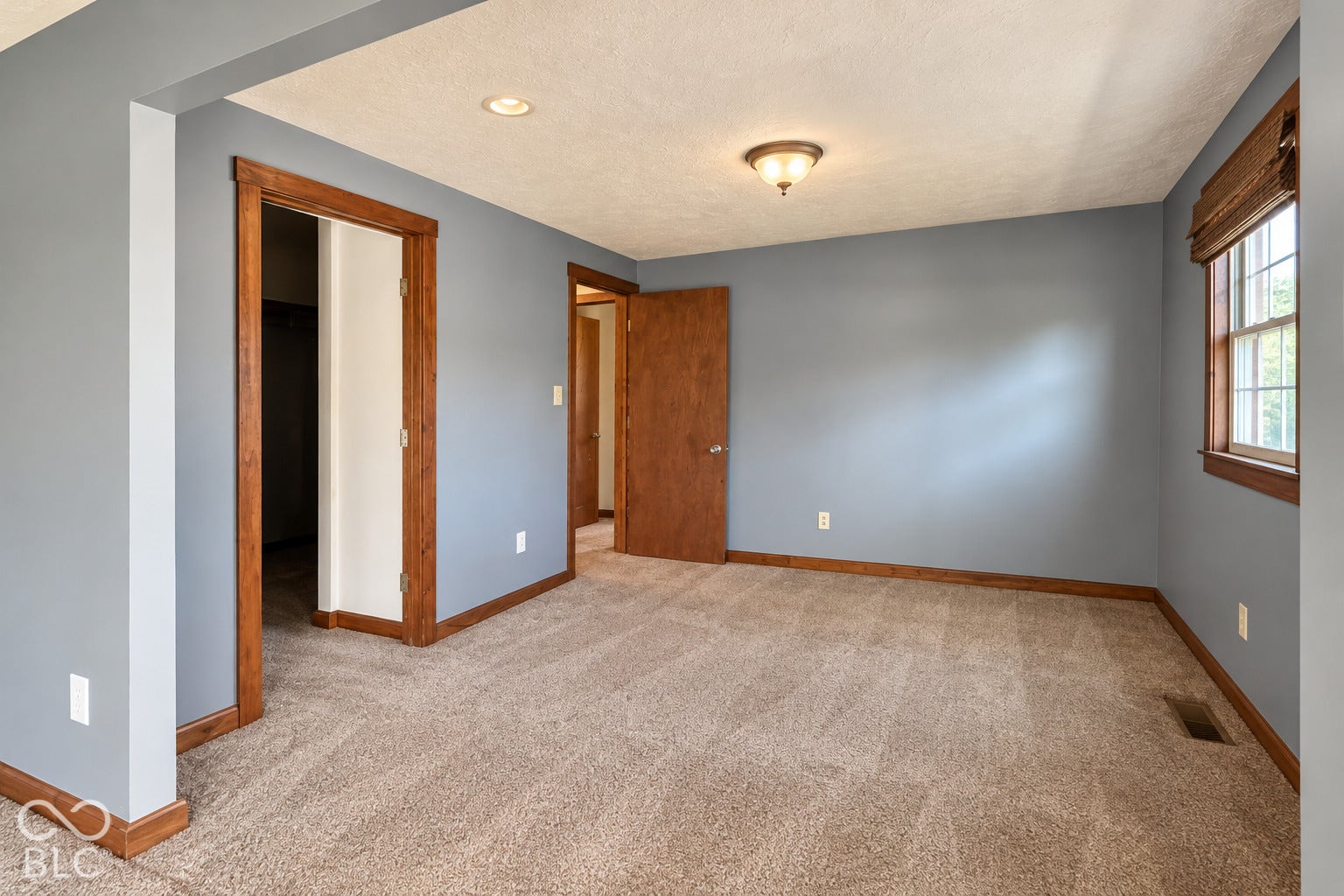 1802 Heather Court, Indianapolis, IN 46229 Virtually Altered - Room featuring carpeting, recessed lighting, ceiling-mounted light fixture, wood-trim door casings, and wood-trim window casing
