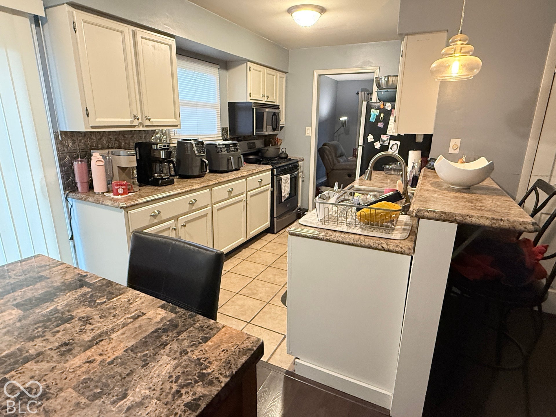 928 W 79th Street, Indianapolis, IN 46260 No lack of cabinet space here and great counter tops for plenty of family dinners - appliances stay - gas stove!