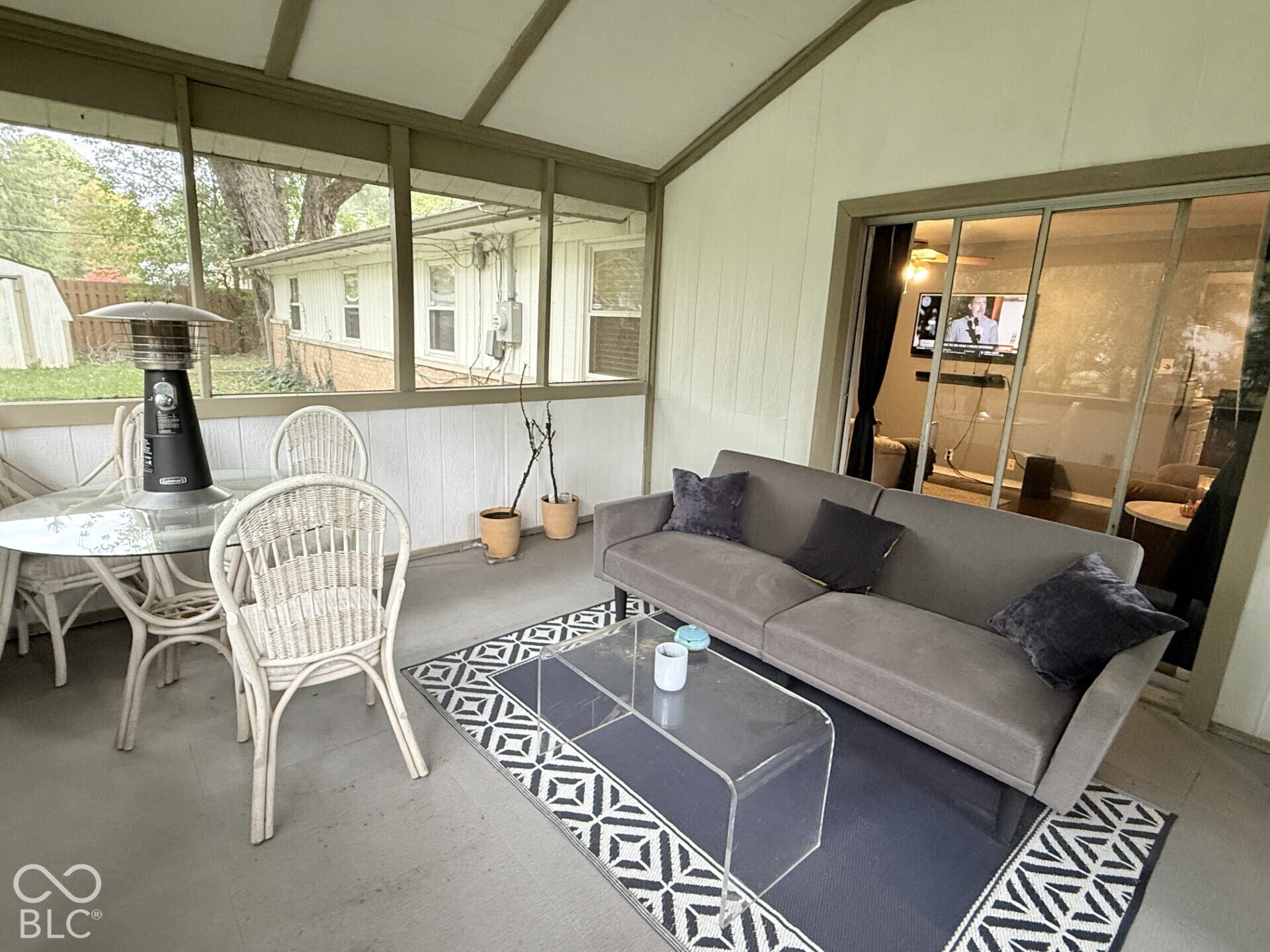928 W 79th Street, Indianapolis, IN 46260 This might be the favorite room in the house! Sunporch overlooks huge fenced backyard