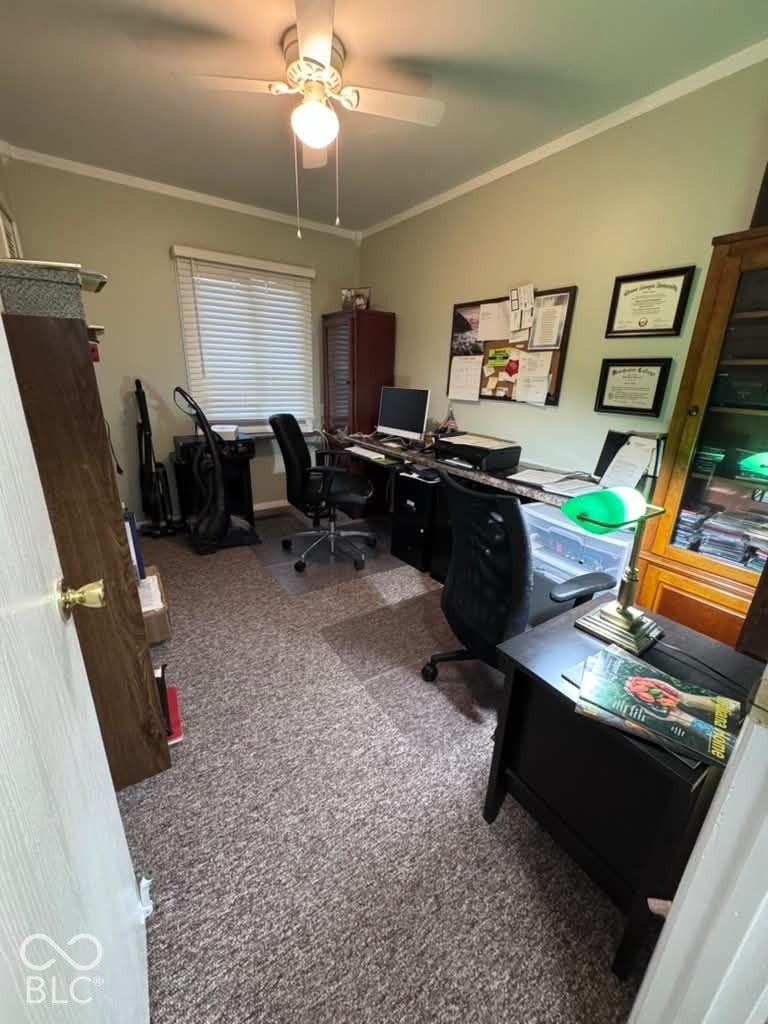 906 S Patterson, Lebanon, IN 46052 Interior room featuring carpeting, a ceiling fan with integrated lighting, and a window with horizontal blinds