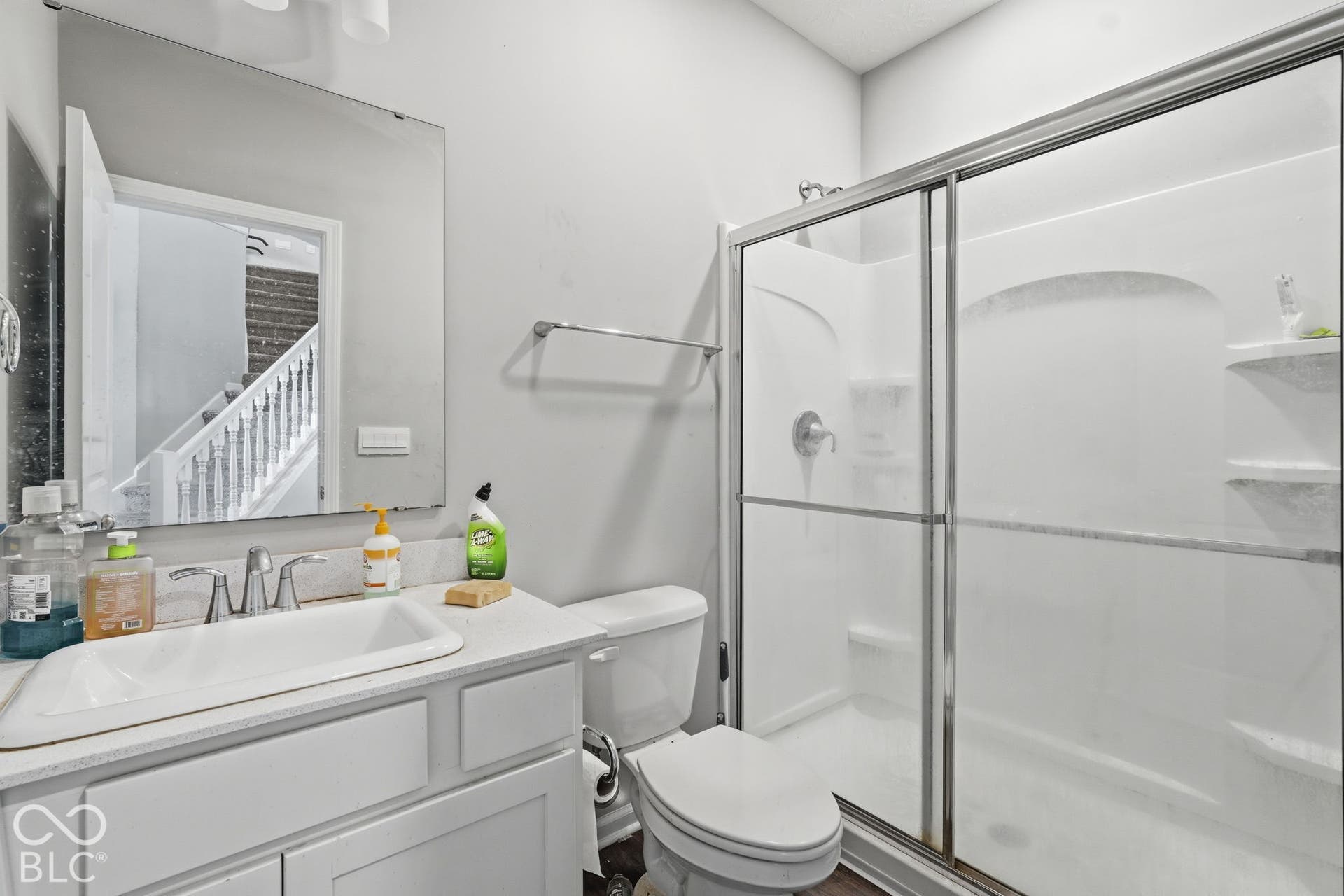 Downstairs bathroom with full shower stall.
