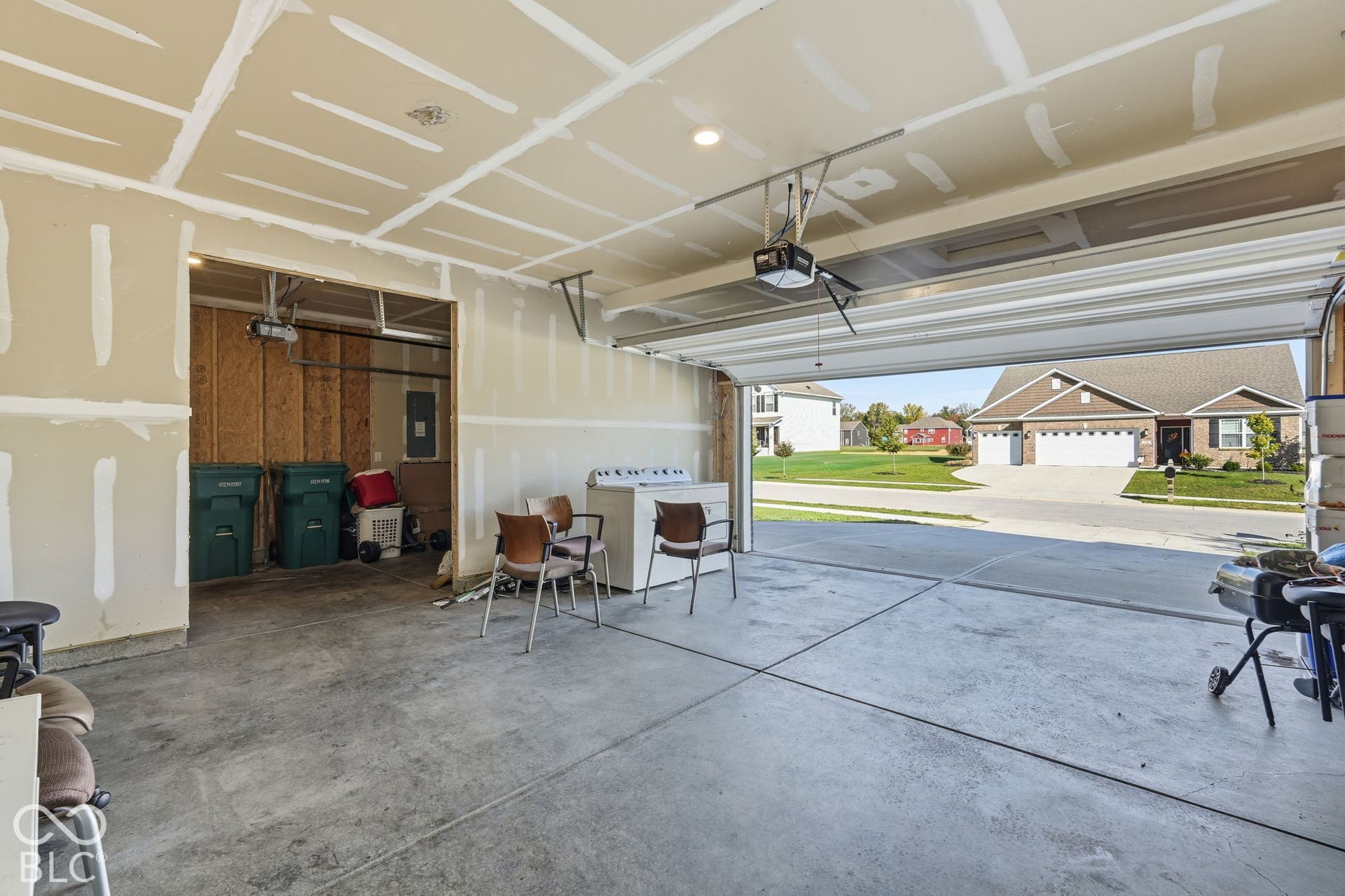 2 car garage with additional garage room.
