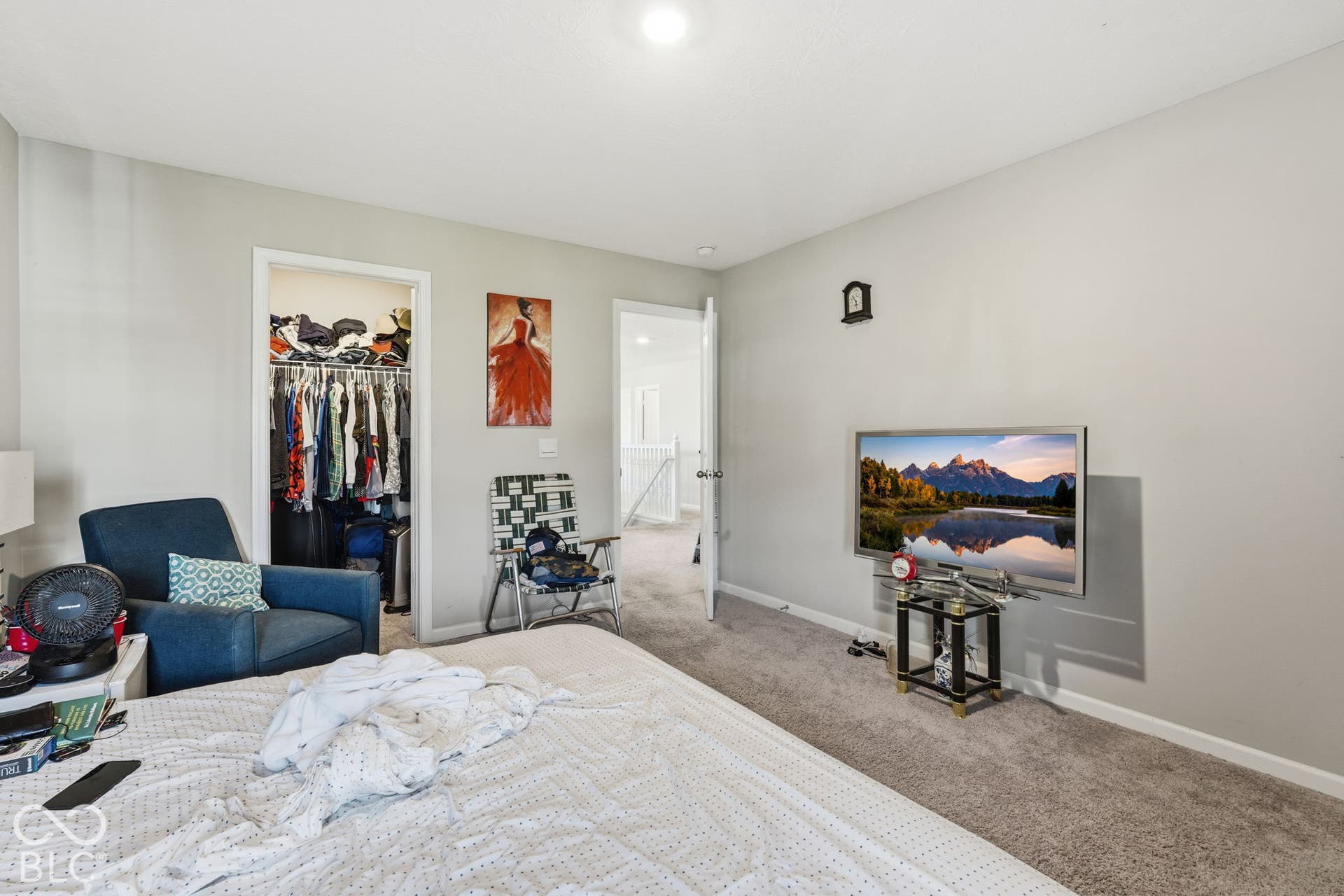 Bedroom with walk-in closet.