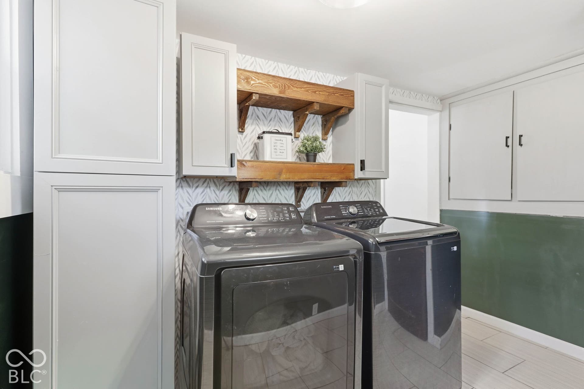 Originally the Kitchen - Now a HUGE Laundry Room with Xtra Storage off the Kitchen.