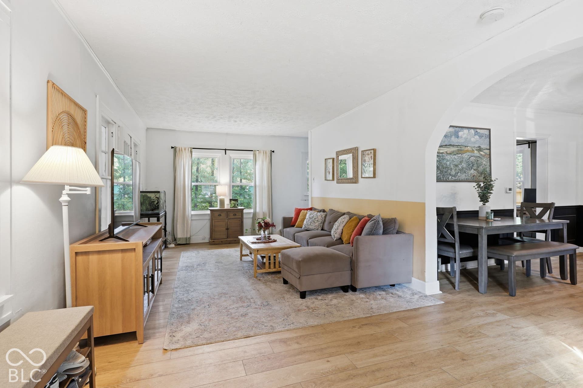 Large Great Room with Updated Vinyl Plank Floors and so much light!