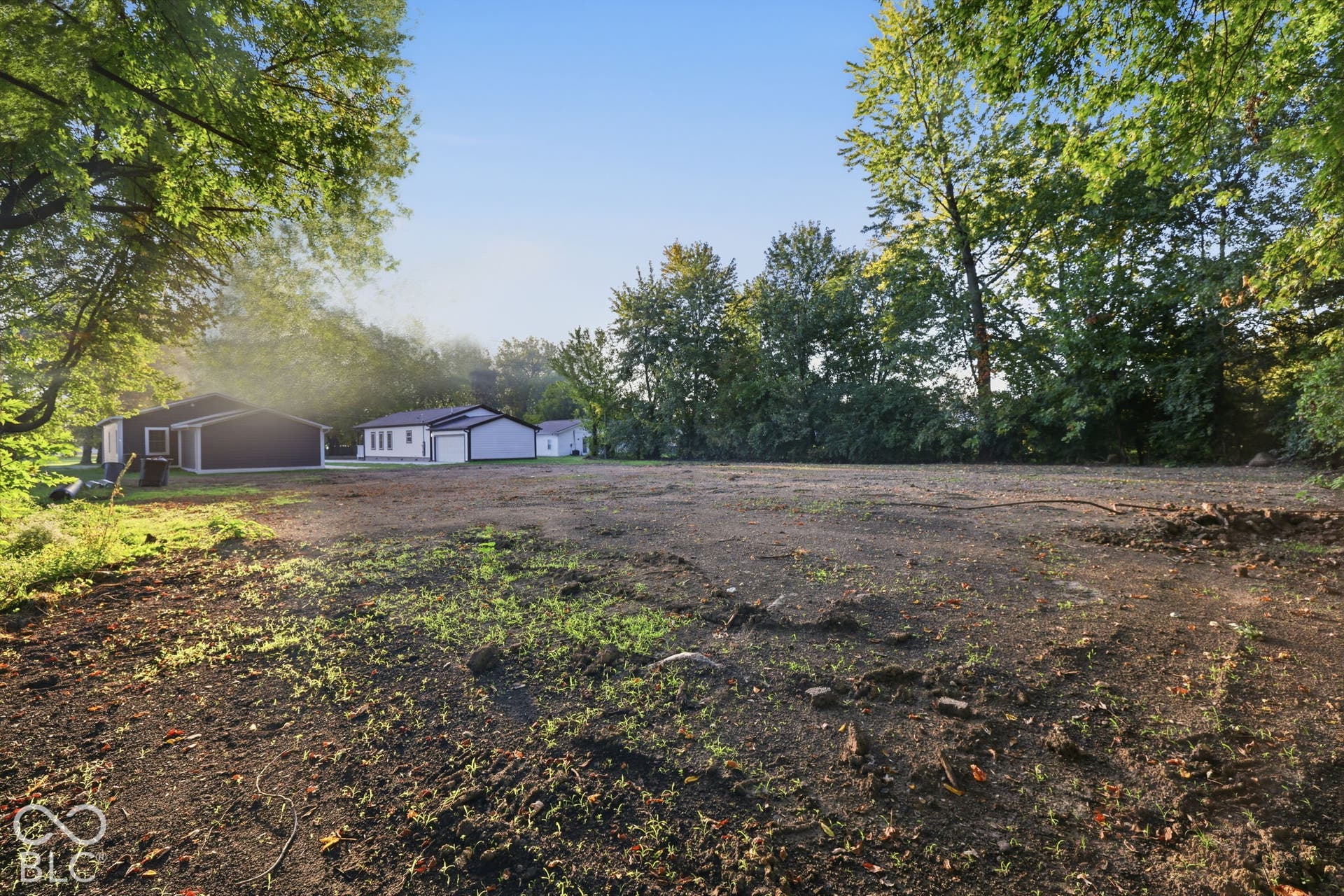 Expansive parcel featuring mature trees and clear terrain